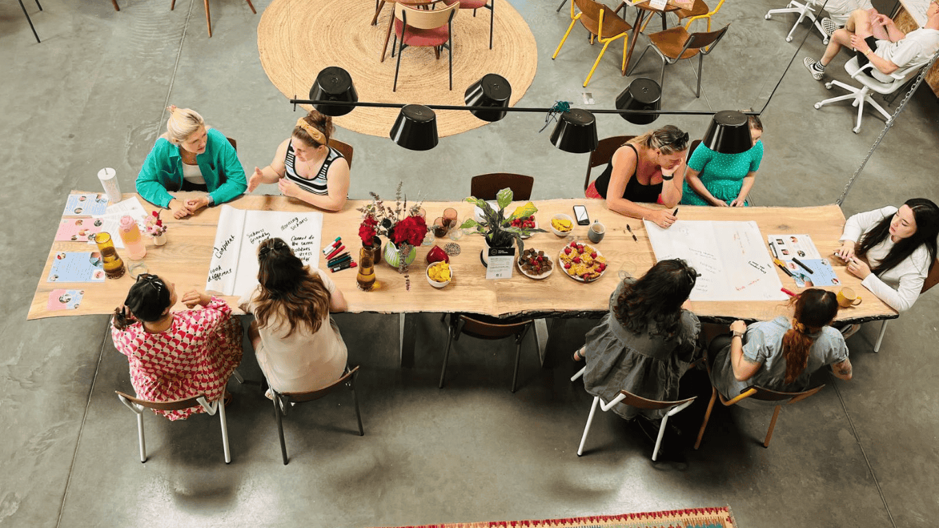 Pregnant women around a table at Hartley farm in Bradford on avon in Wiltshire, discussing their pregnancy and birth