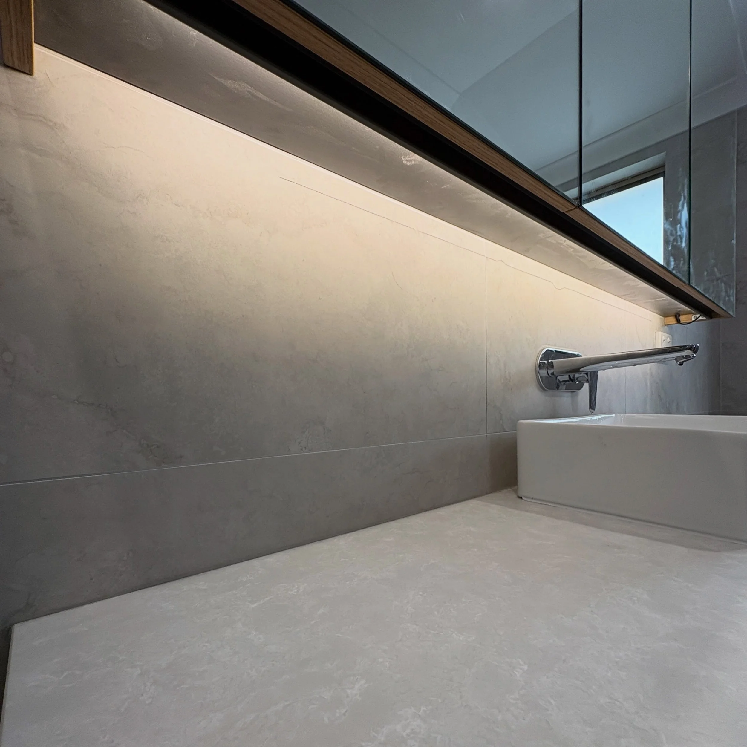 💡 It&rsquo;s all about the details 

A subtle strip light installed neatly behind this bathroom cabinet, creating a soft, ambient glow without the light source being visible.

From a low angle, you can&rsquo;t even see the strip light &mdash; just t