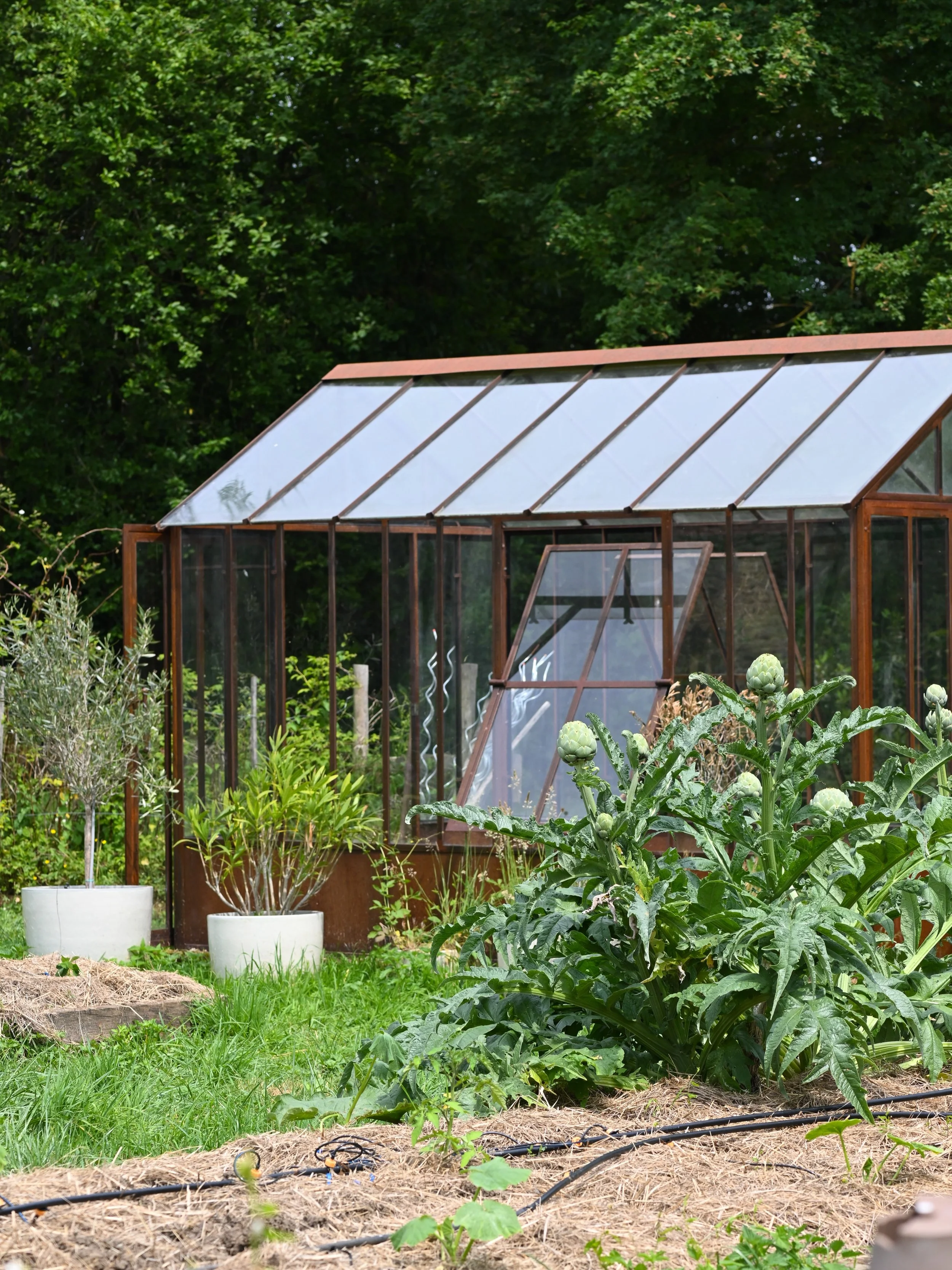 de kas in de moestuin