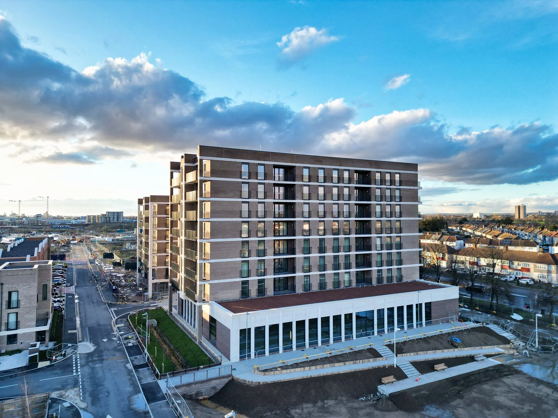Modern, multi-story student accommodation, situated in an urban area.