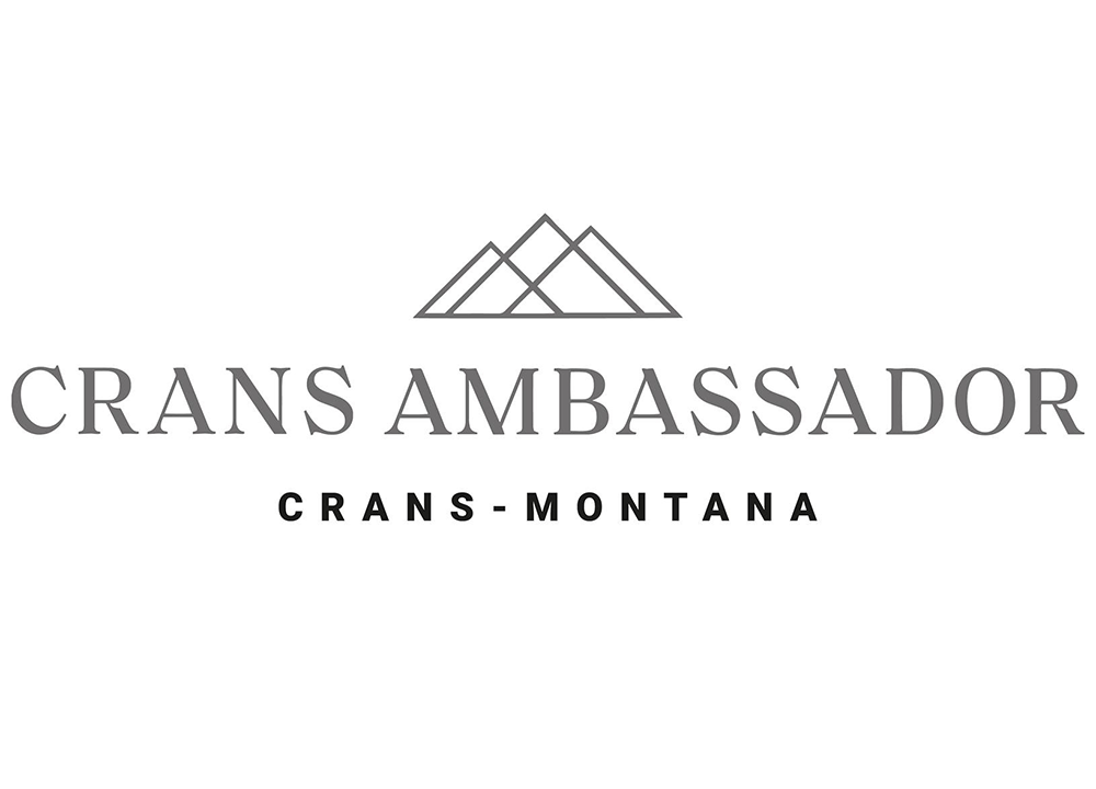 Logo for Crans Ambassador hotel with mountain graphic and text, Crans-Montana.
