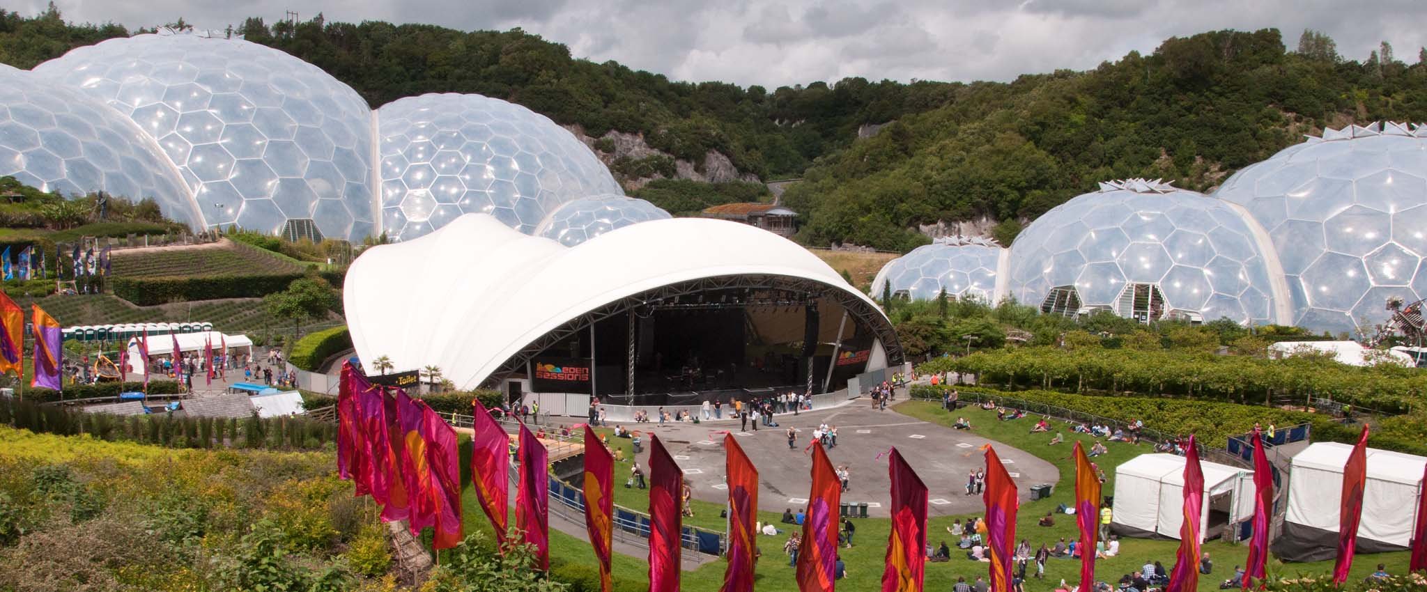 Eden project biomes with red flags in the foreground