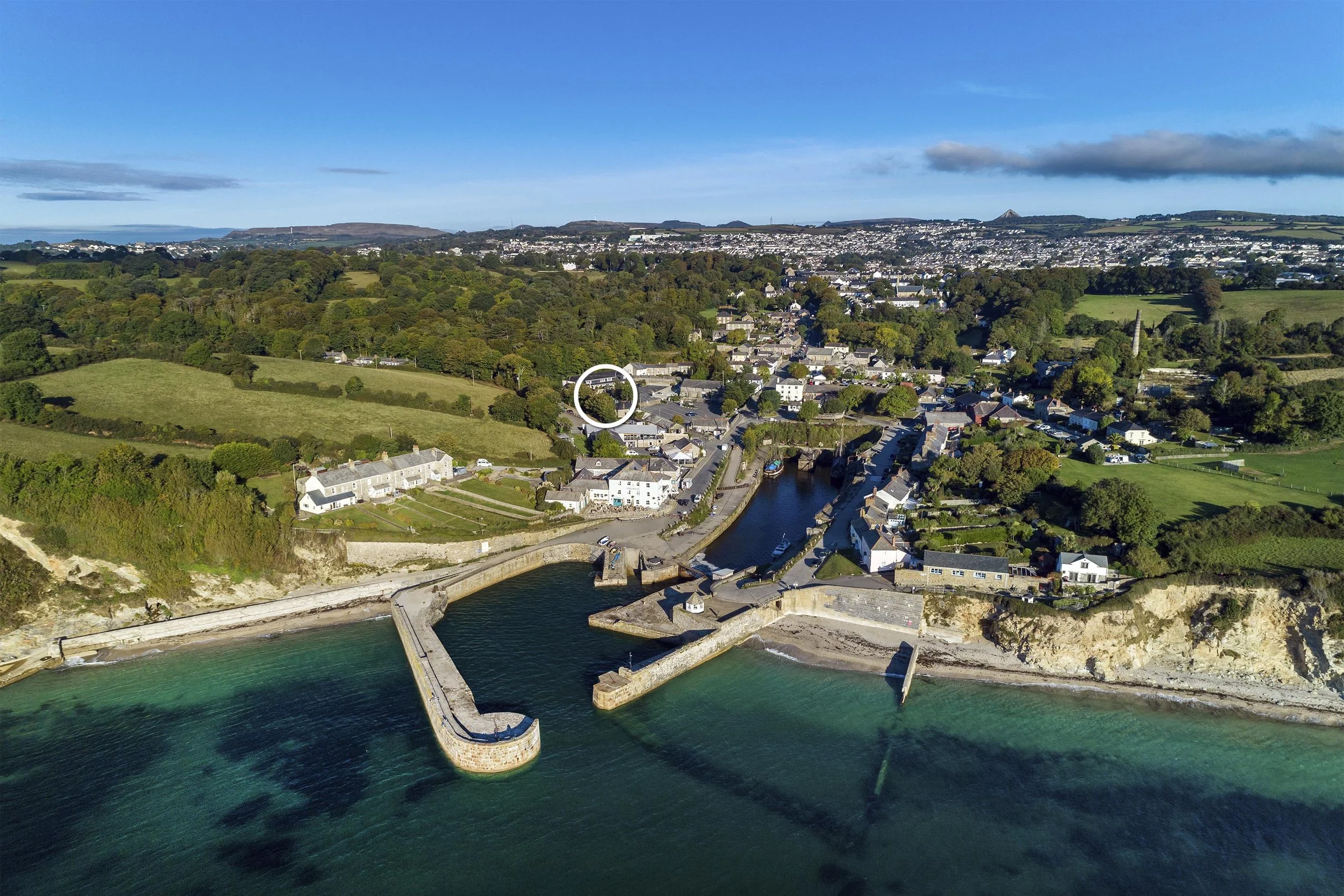 Aerial view of Charlestown Harbour with the Tall Ships property circled to identify it within the village.