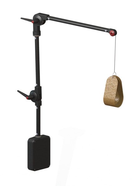 A mount with an adjustable arm holding a piece of bread with a string attached.