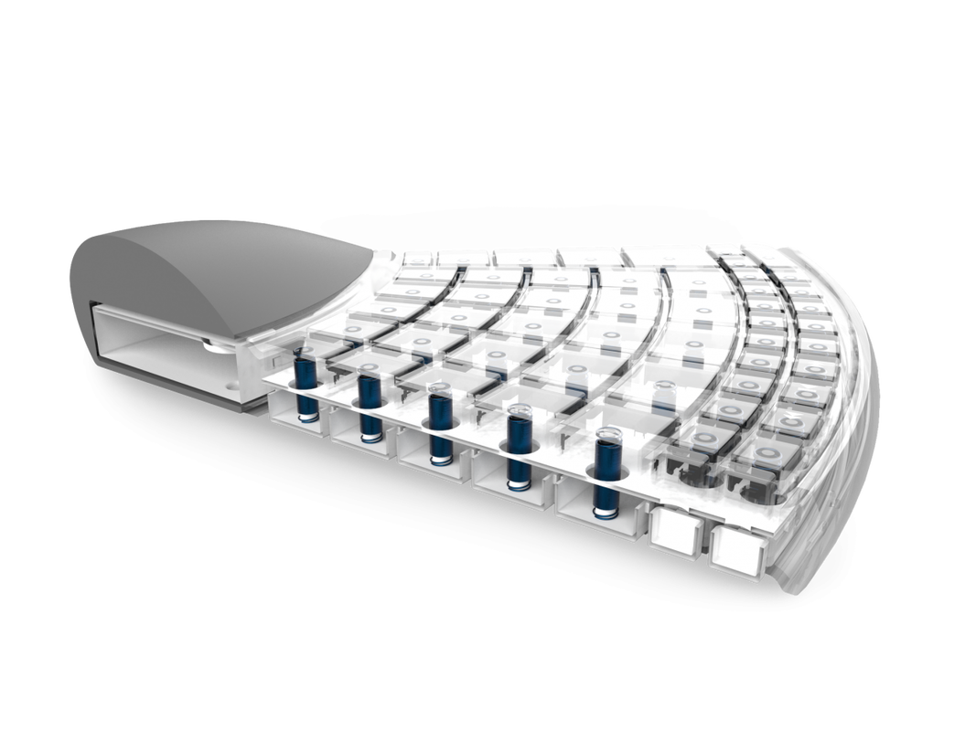 Close-up of a row of COVID-19 vaccine vials in a multi-dose vaccine dispenser.