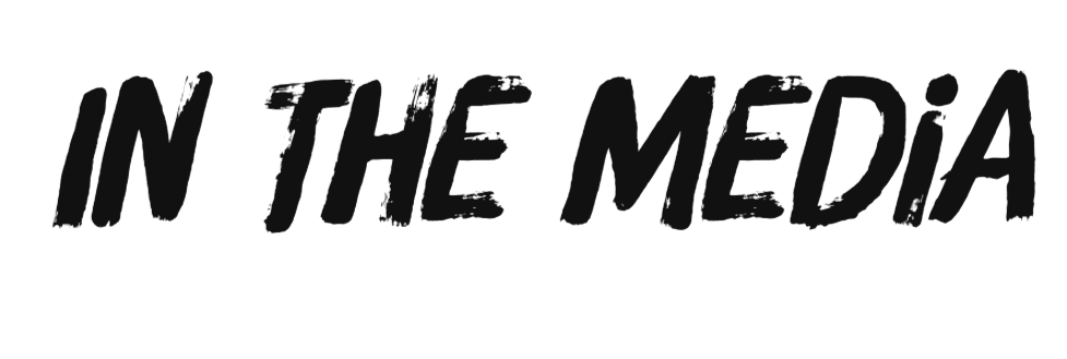 Text reading 'In the Media' in black, stylized font.