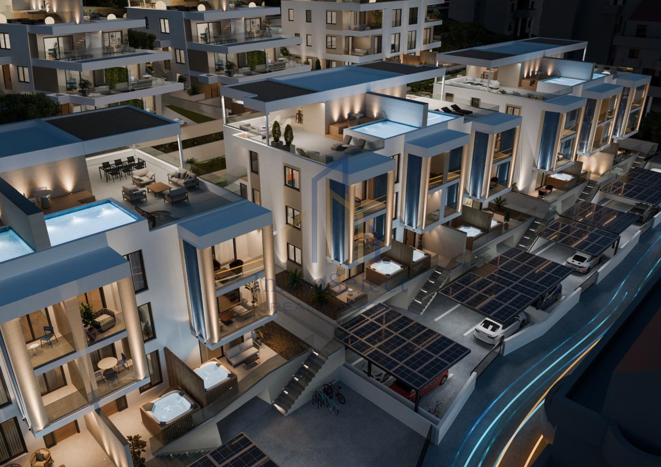 Night view of a modern residential complex with multiple multi-story buildings, rooftop pools, outdoor seating areas, and solar panel-covered parking spaces.