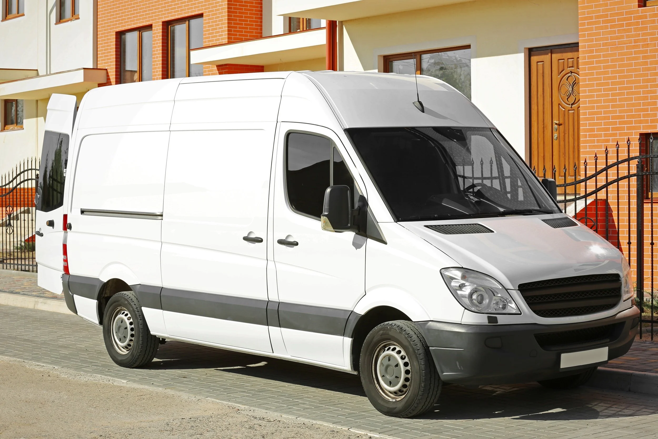 white van parked on residential street