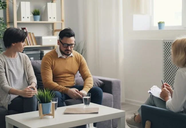 Couple reconnecting during a supportive couples therapy session in Rockville Maryland