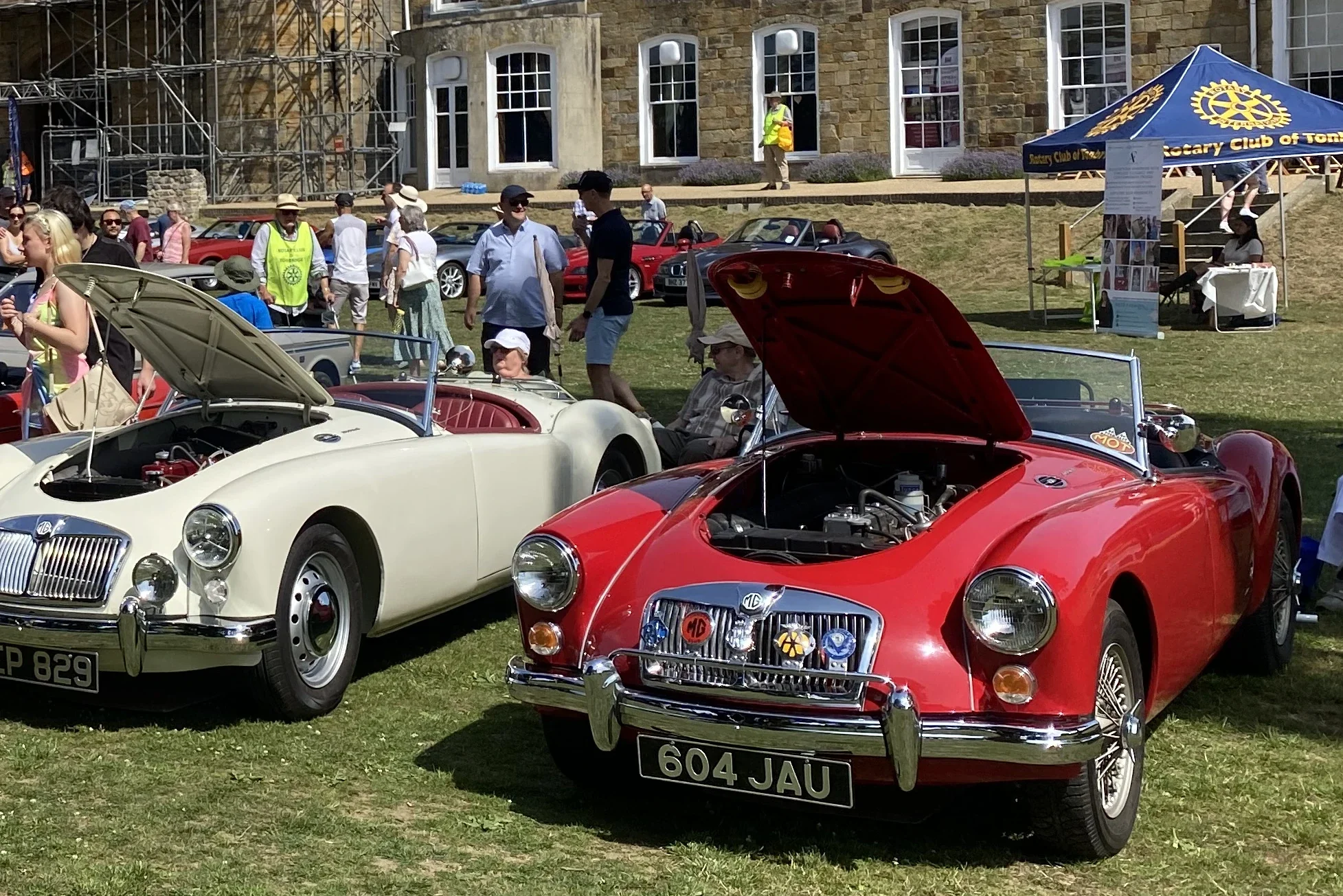two classic cars on show at the Rotary Classic Car Show on Tonbridge Castle Lawn