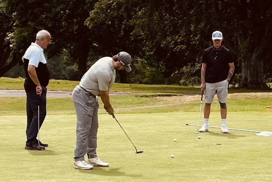 The Babons golf team putting for glory on the 18th green at Lamberhurst Golf Club at the Tonbridge Rotary Charity Golf Day 2026