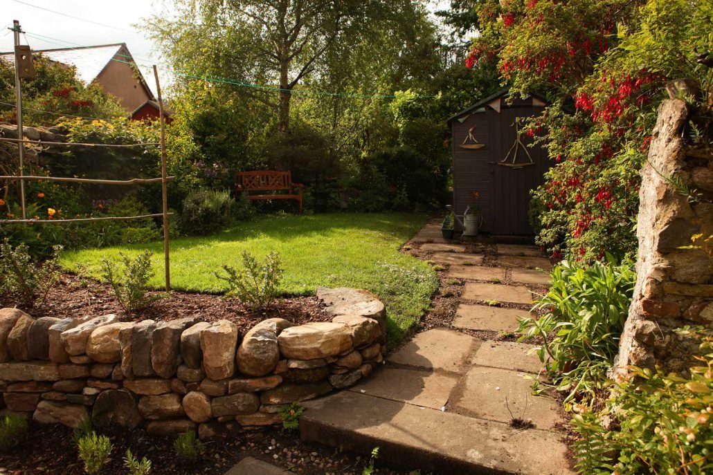 A garden redesigned for bees and other invertabrates located behind a Victorian mid-terrace house in the centre of Fortrose, Black Isle.