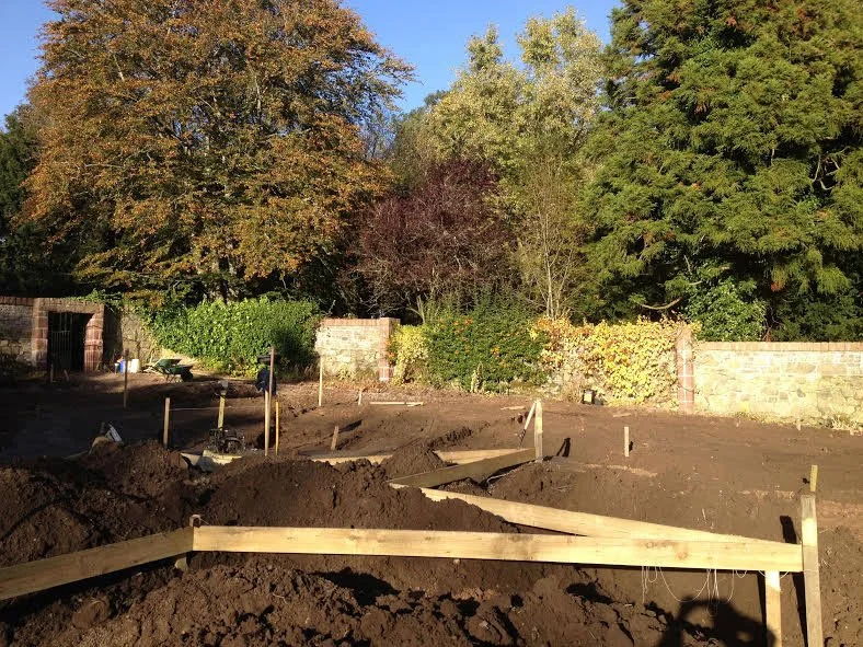 Fillig the beds with topsoil and compost at the Marian Garden, Kilcoy Castle.