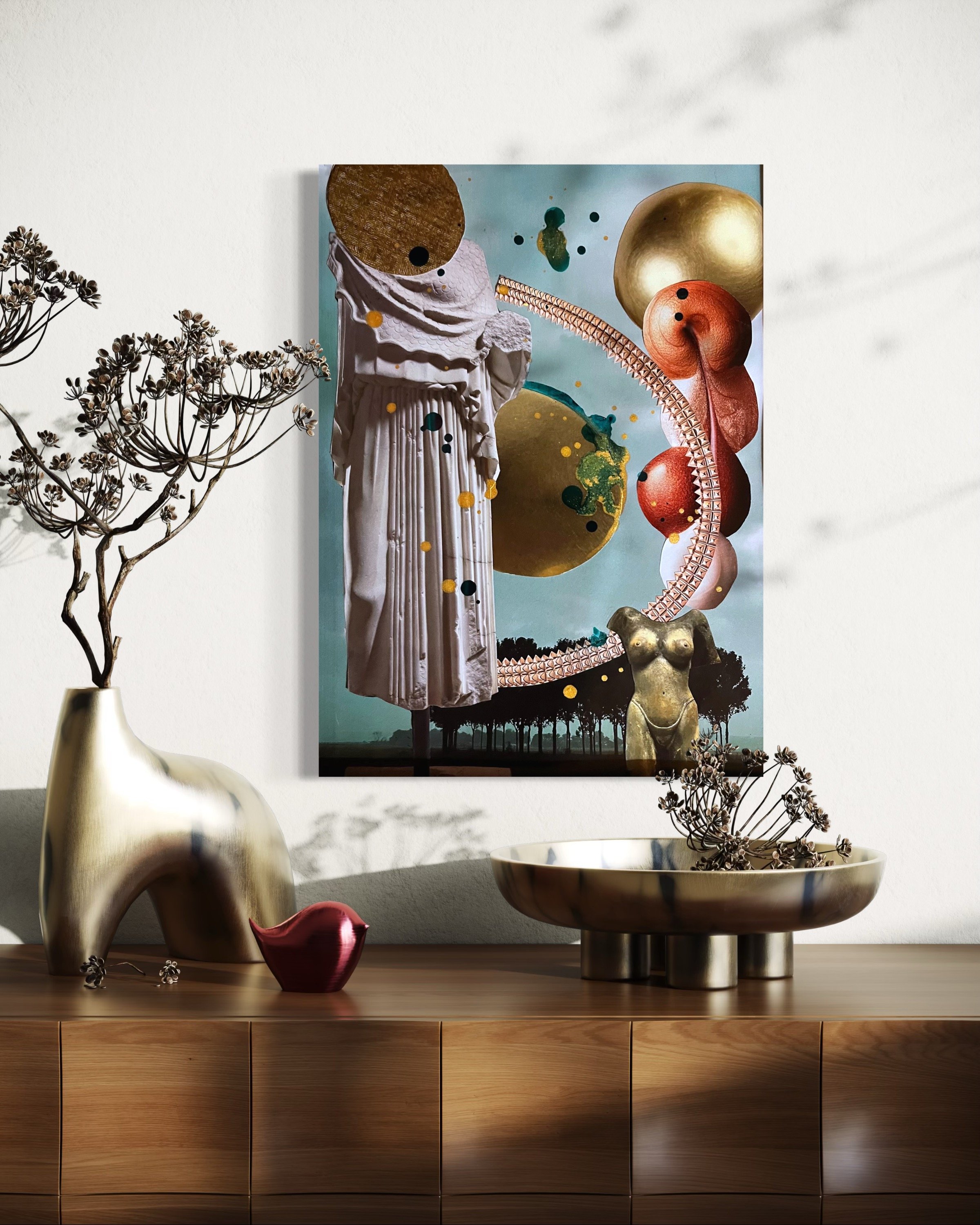 Decorative art display with classical sculpture, colorful abstract shapes, and sculptures of a female torso and a bird on a wooden sideboard, with a gold abstract vase and dried plant arrangement.