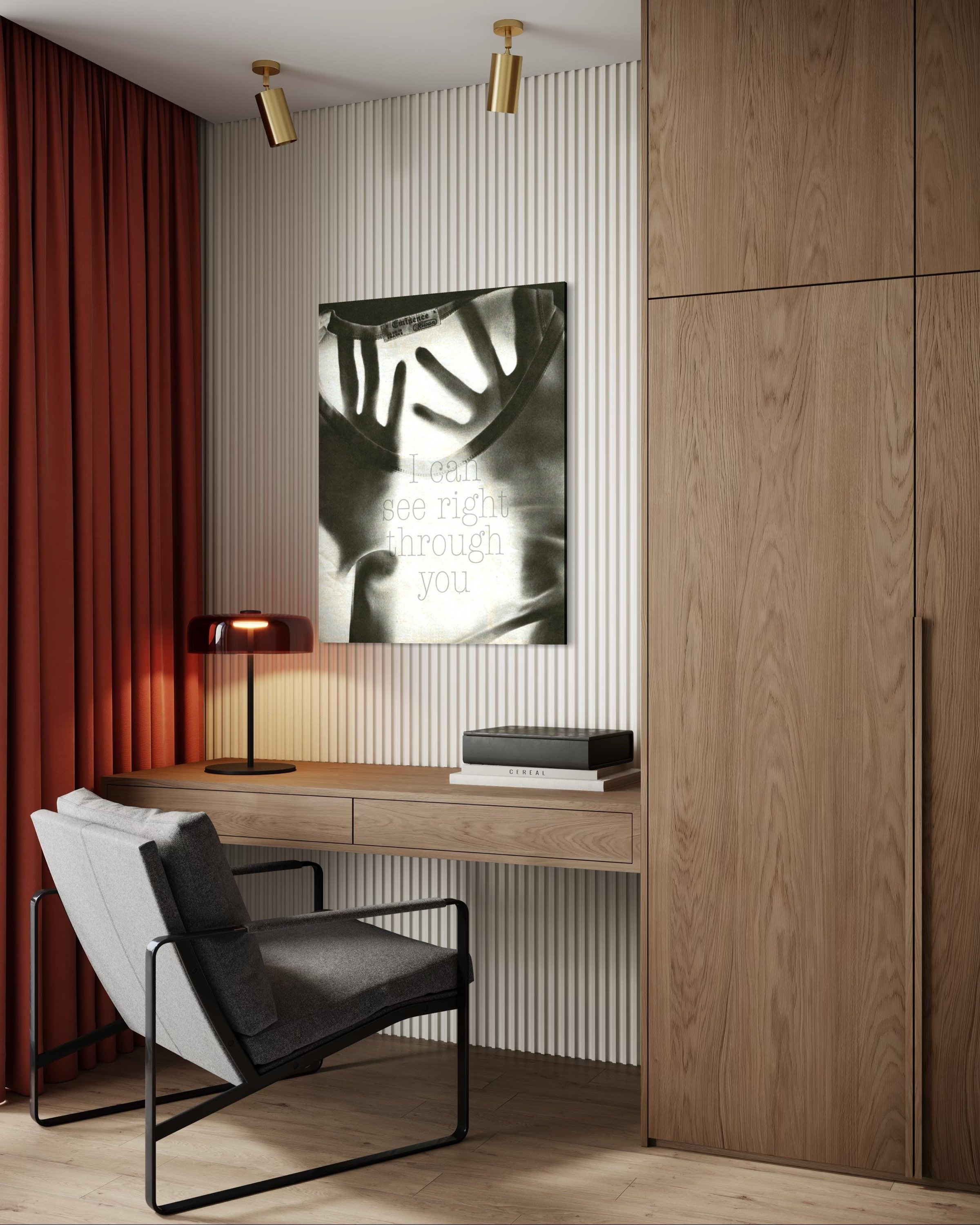 Modern workspace with a desk, gray chair, black and white artwork, red curtain, and wooden accents.