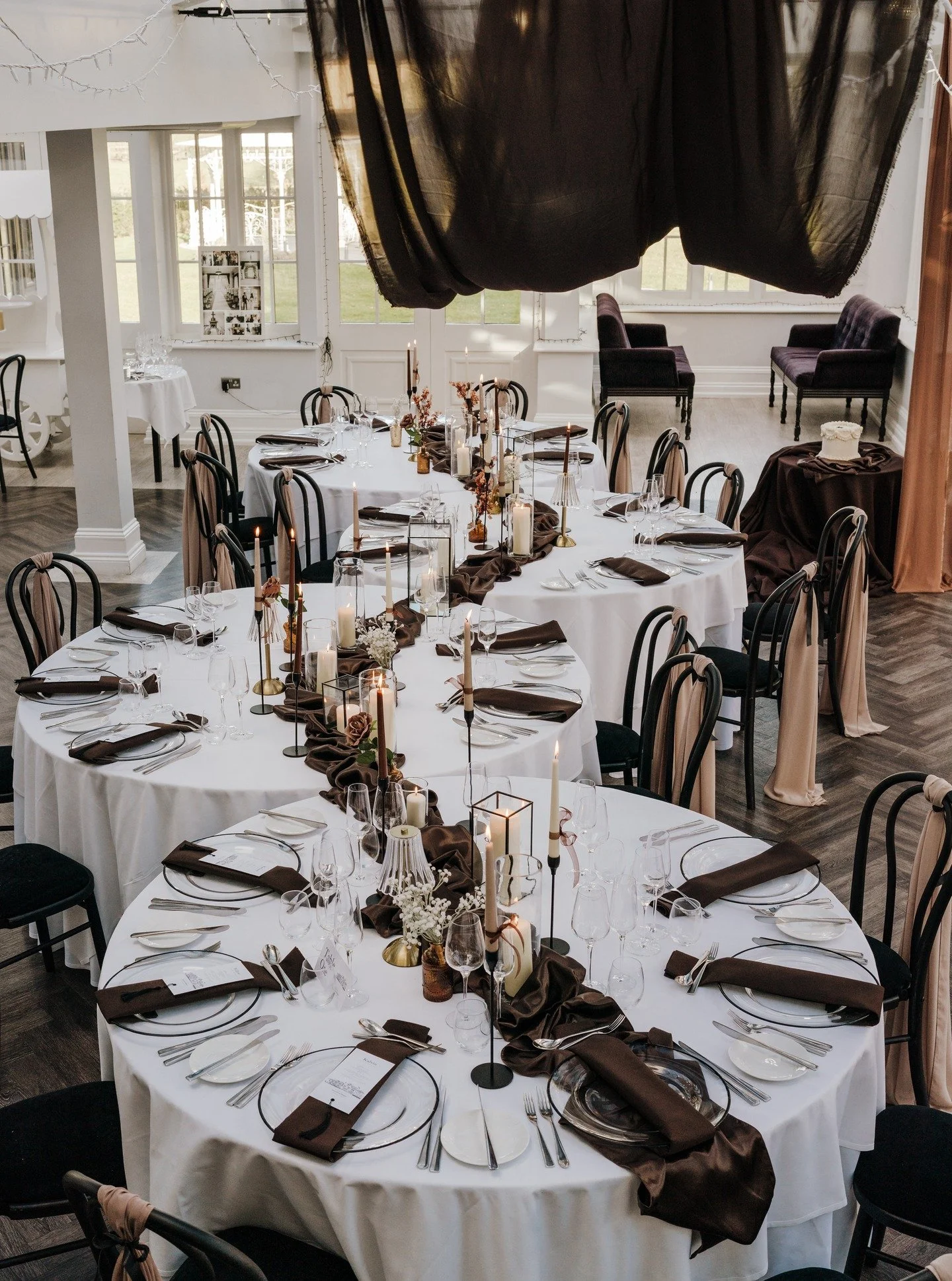 Intimate weddings + caterpillar tables = magic.

This kind of layout keeps everyone connected. No split tables, no separate conversations, just one long - flowing space that feels warm, relaxed and intentional.

The continuous candlelight, layered li