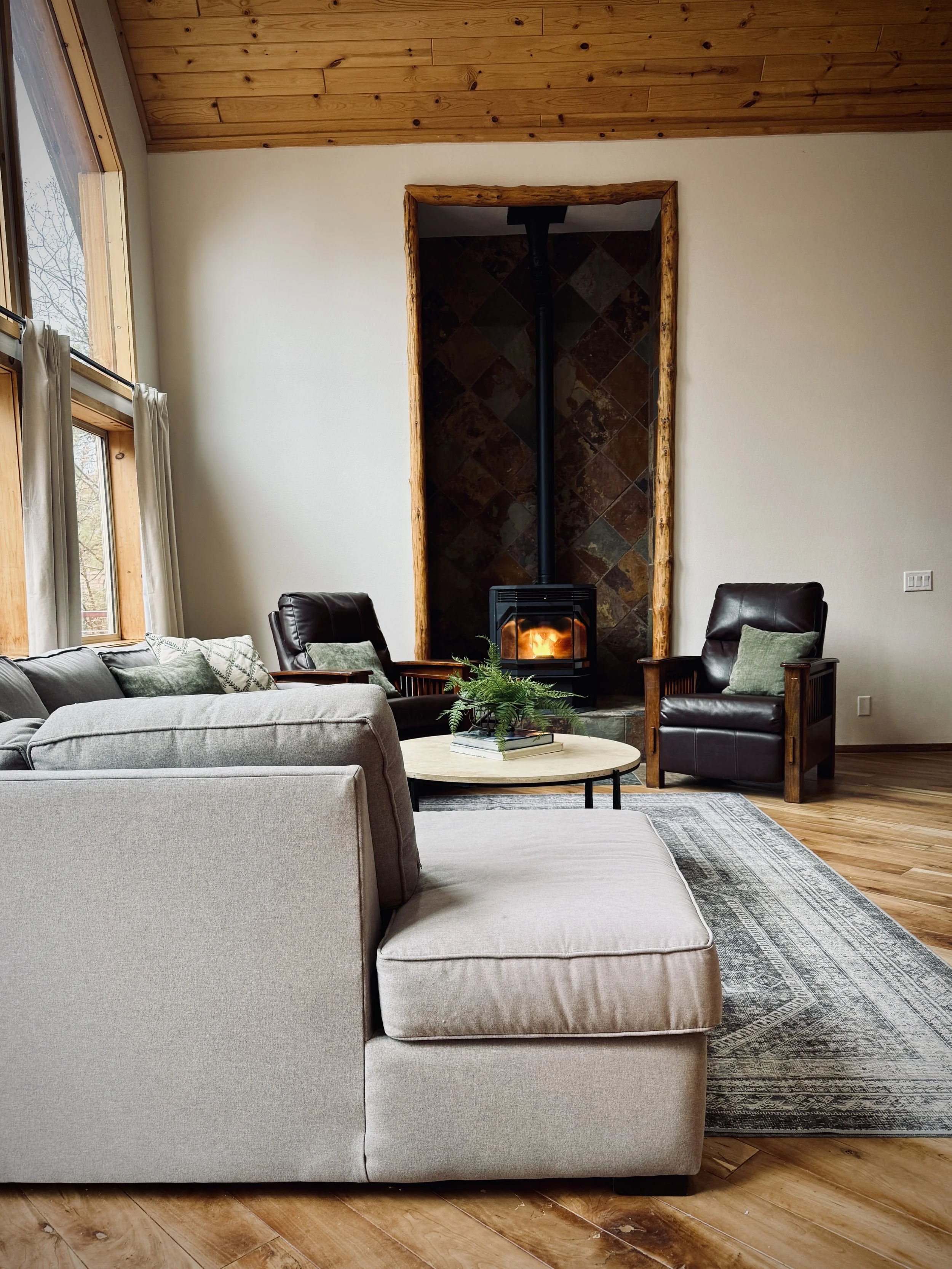 A cozy and welcoming living room in the Estate House, perfect for relaxing together.