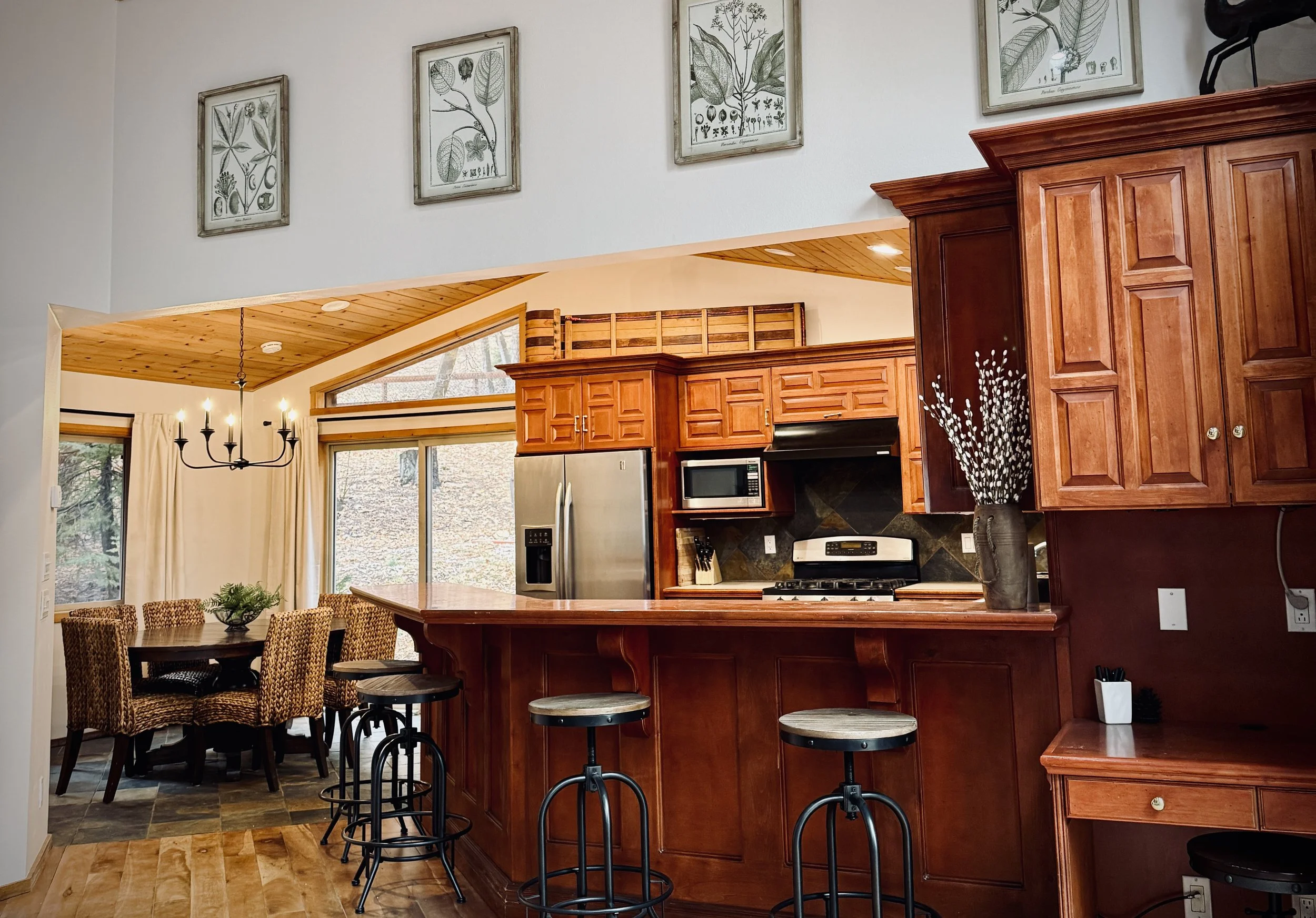 The Estate House kitchen features a spacious peninsula, and an open layout ideal for gathering.