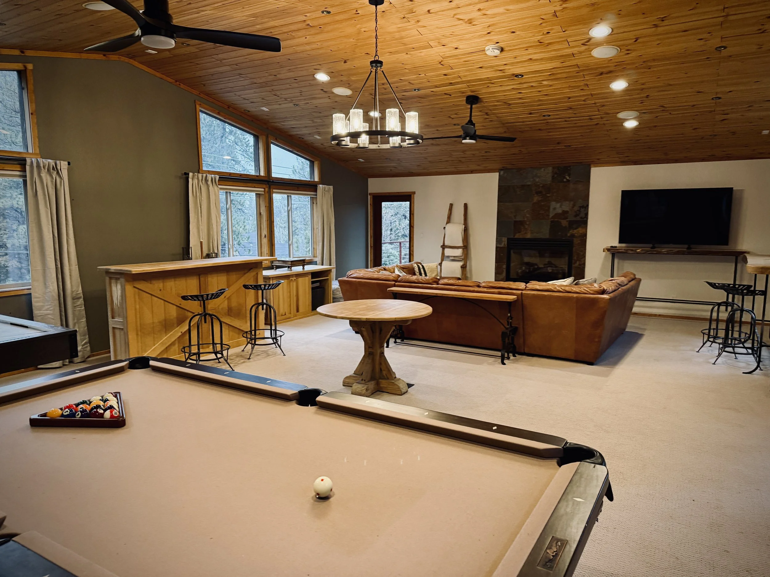 The Lodge is the perfect place for game nights, movies, watching sporting events, or simply gathering with friends and family. 