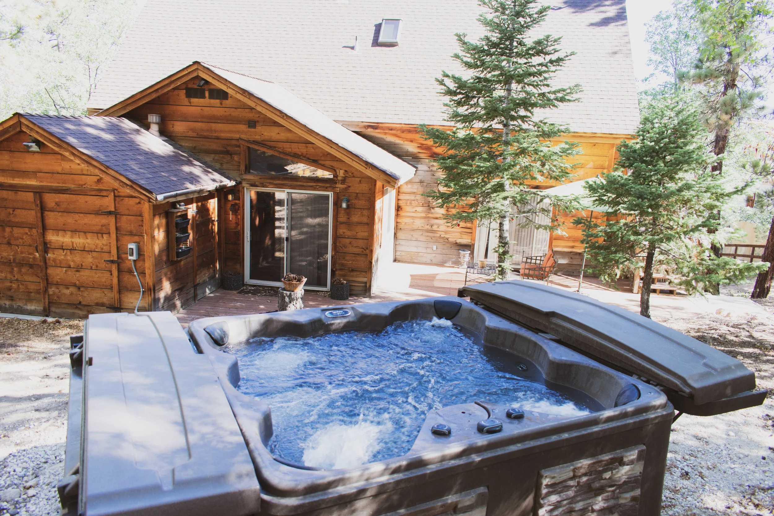 Unwind in one of two hot tubs after a full day of mountain adventures.
