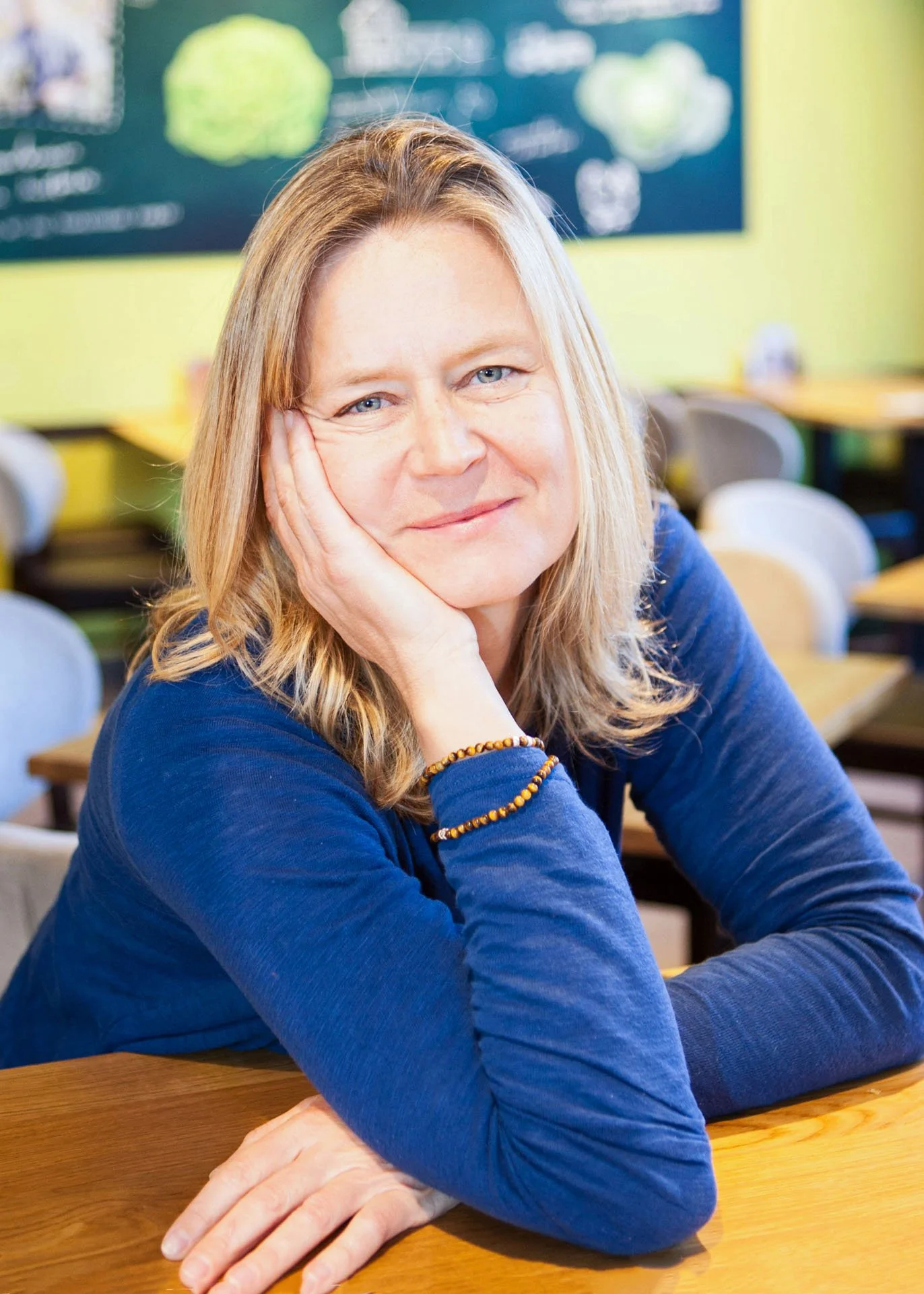 image of a lady in a cafe smiling catherine lewisphotography .jpg
