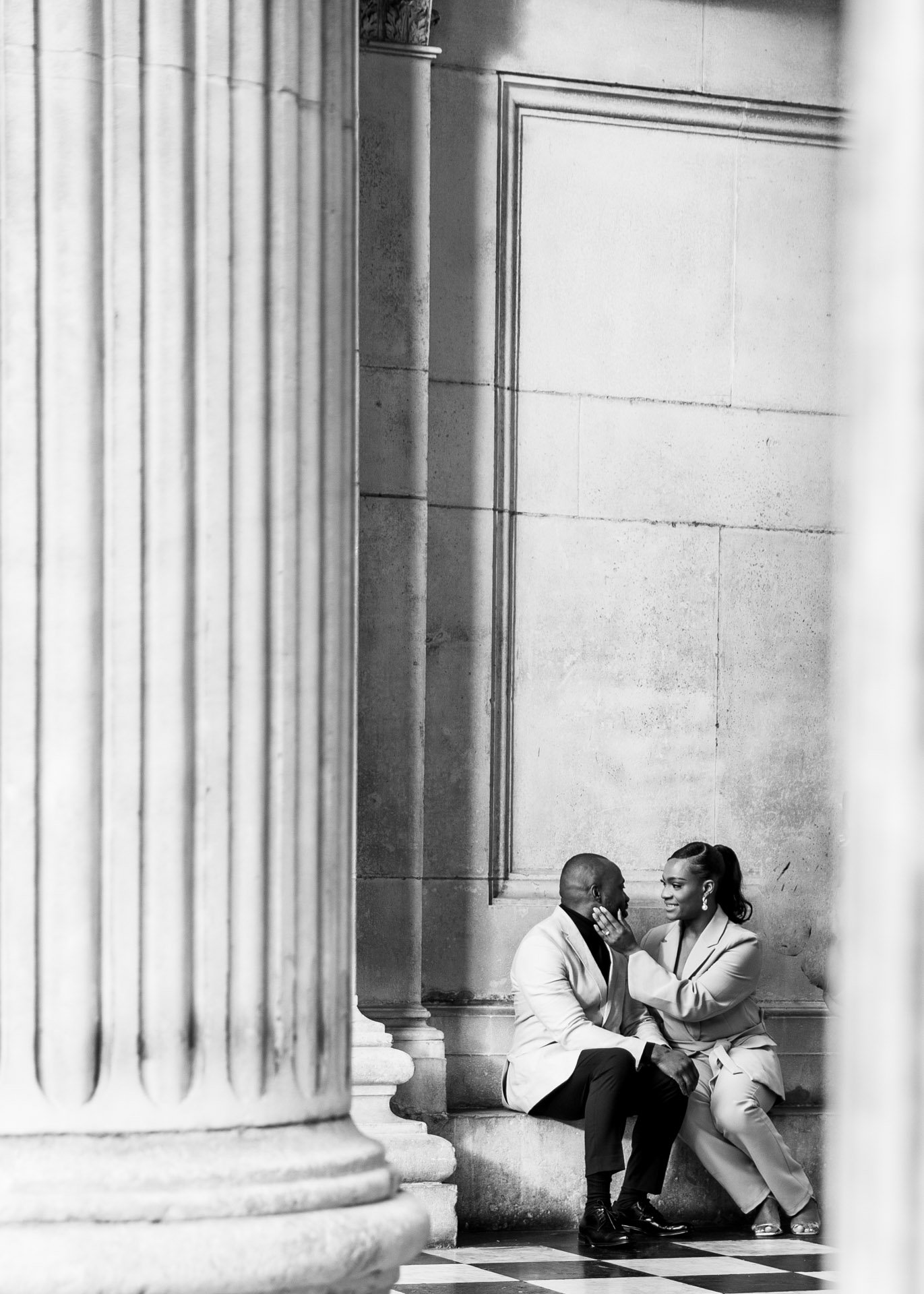 loving couple in entrace to St Pauls catherinelewisphotography.jpg