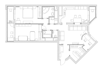 Floor plan of a residential apartment with bedrooms, bathrooms, living area, kitchen, and staircase.