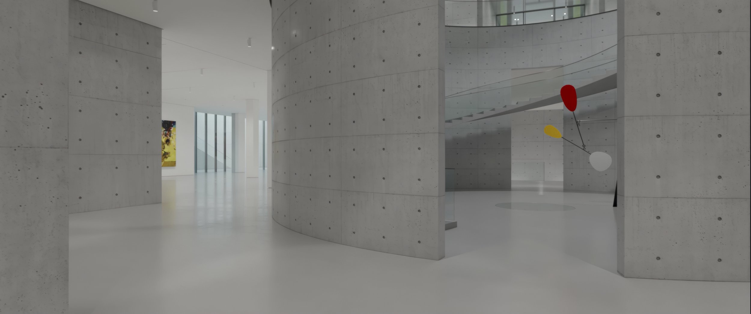 Modern art installation featuring connected abstract shapes in red, yellow, and gray in a spacious concrete gallery.
