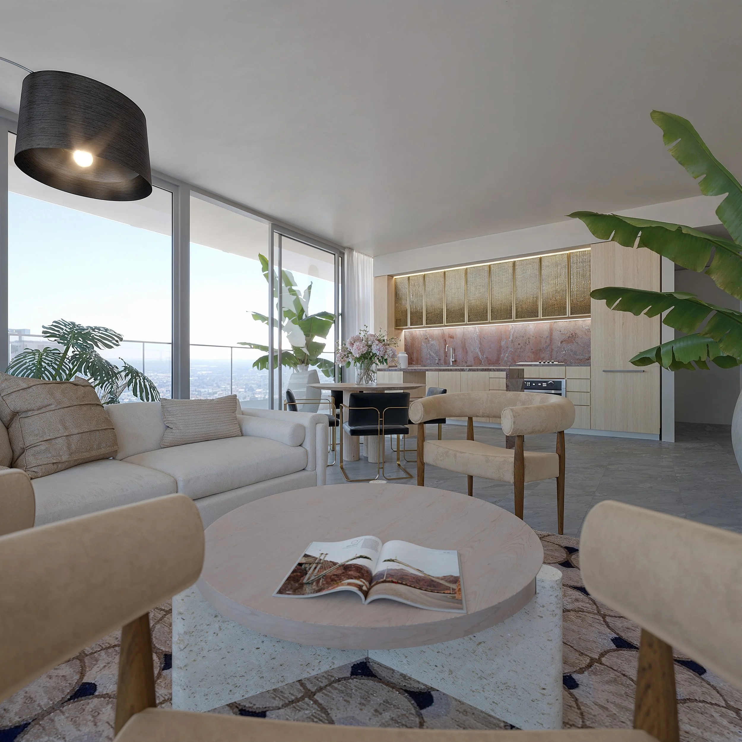 Modern living room with large windows, white sofa, beige armchairs, round coffee table with magazine, potted plants, and open kitchen in the background.