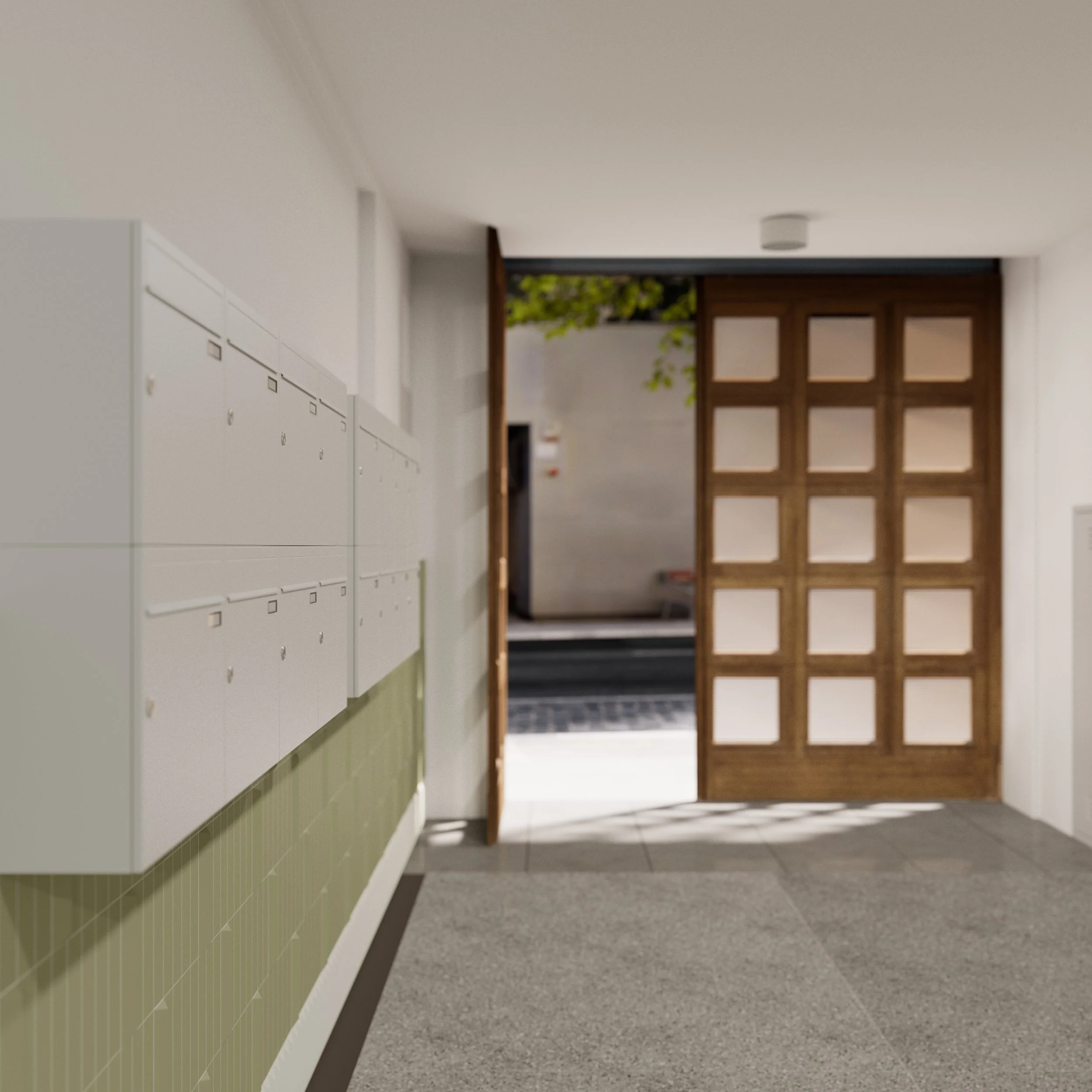 Interior view of a building lobby with white mailboxes on the wall and a wooden grid-style door leading outside.
