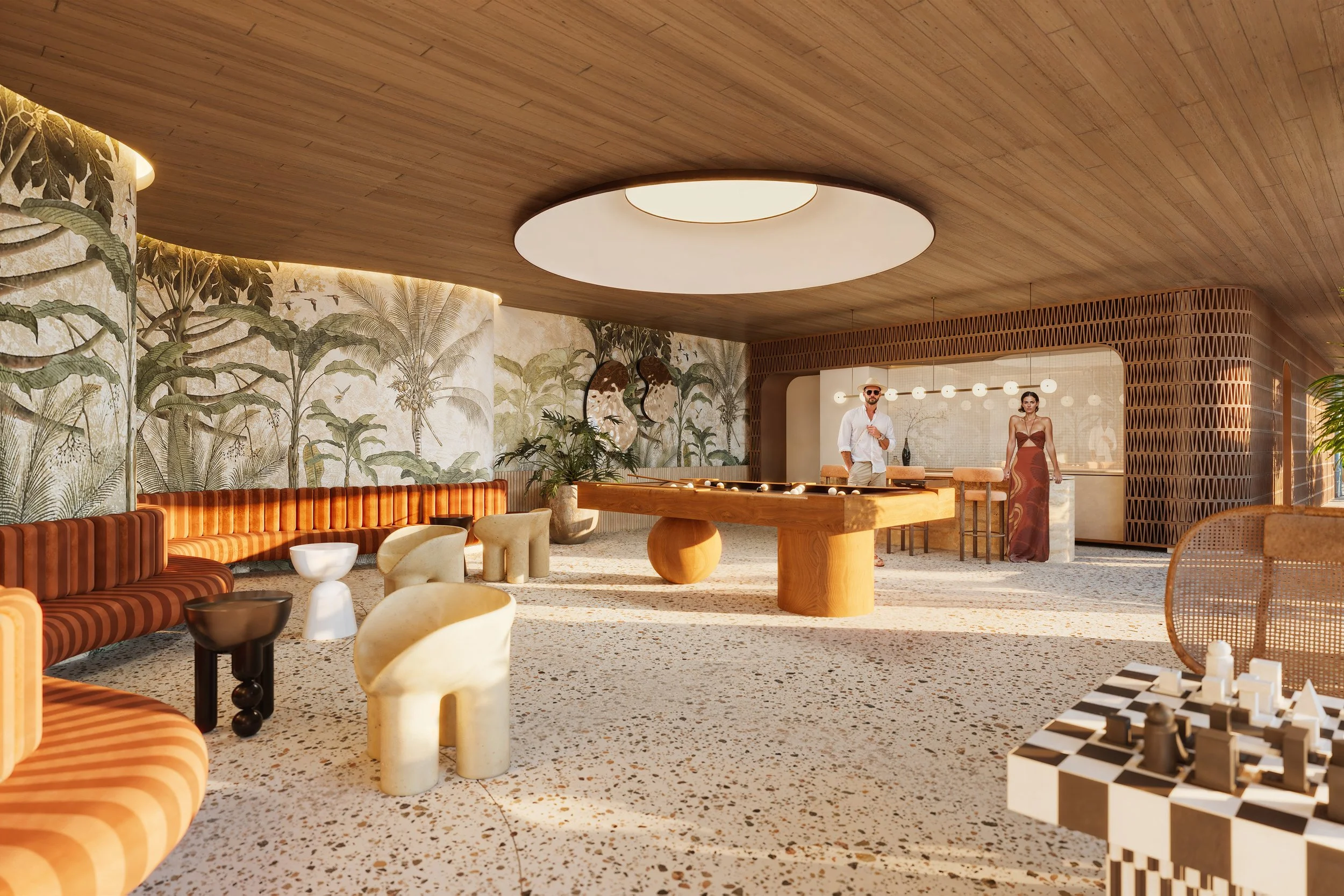 Modern lounge area with tropical wall mural, pool table, seating, and two people near the bar.