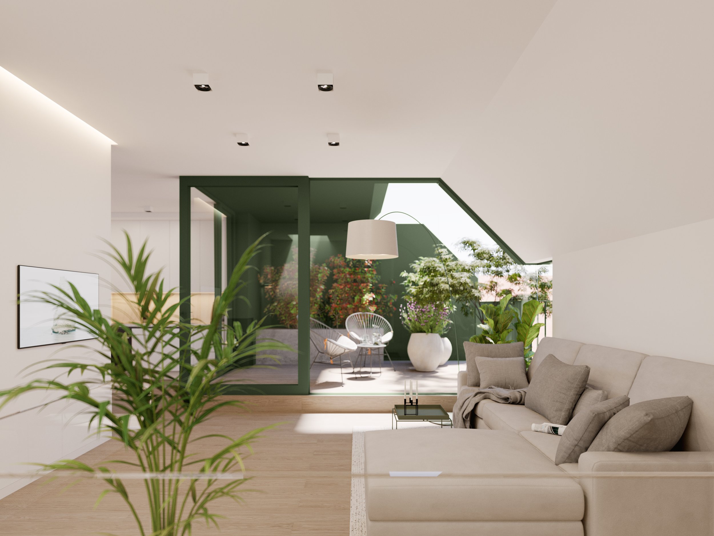 Modern living room with beige sectional sofa, gray cushions, and blankets, and a sliding glass door leading to a balcony with outdoor seating, potted plants, and greenery.