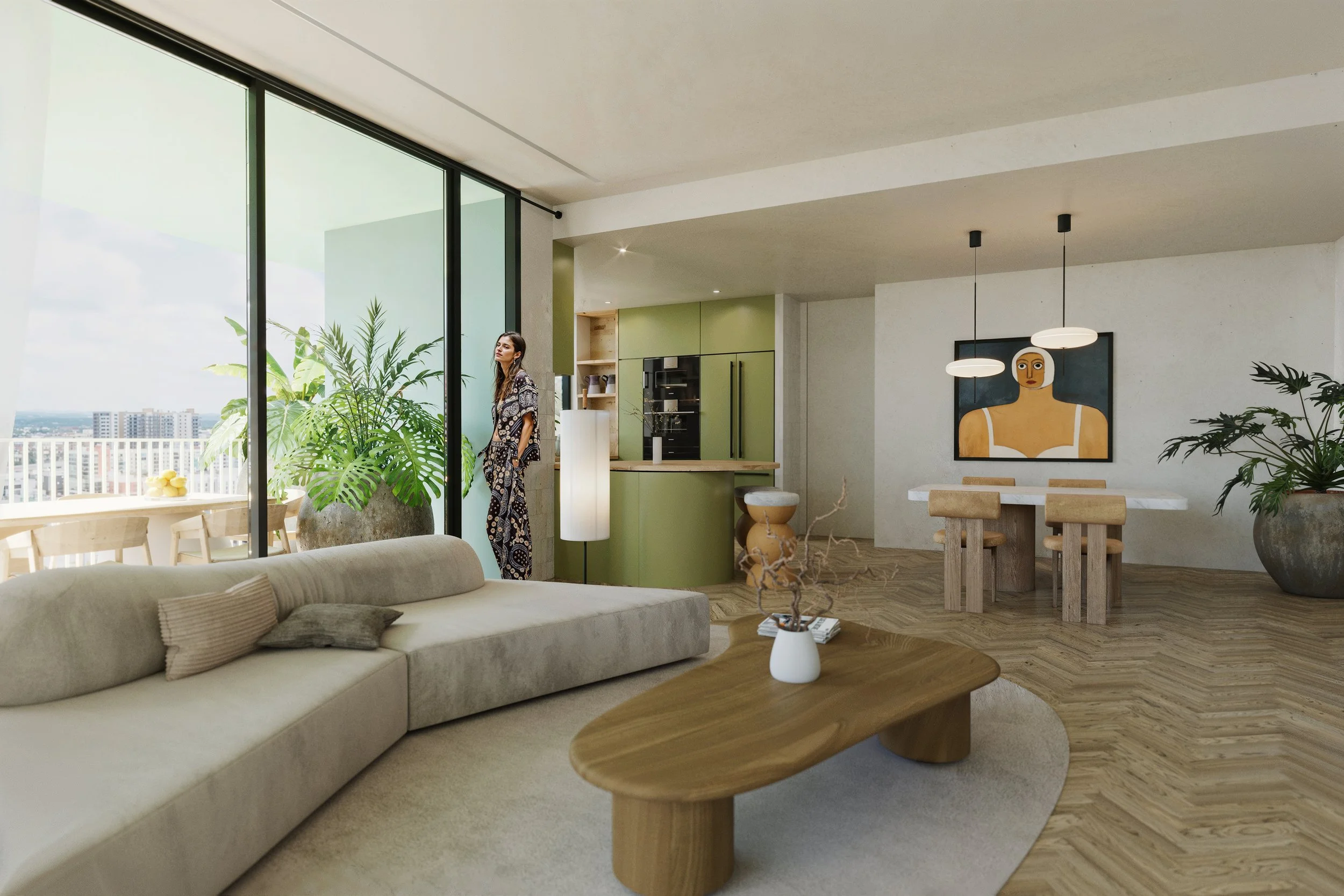 Modern living room with beige sectional sofa, wooden coffee table, large potted plants, and a woman standing near floor-to-ceiling windows. The open-plan space includes a green kitchen area and a dining table with chairs, large artwork on the wall, a