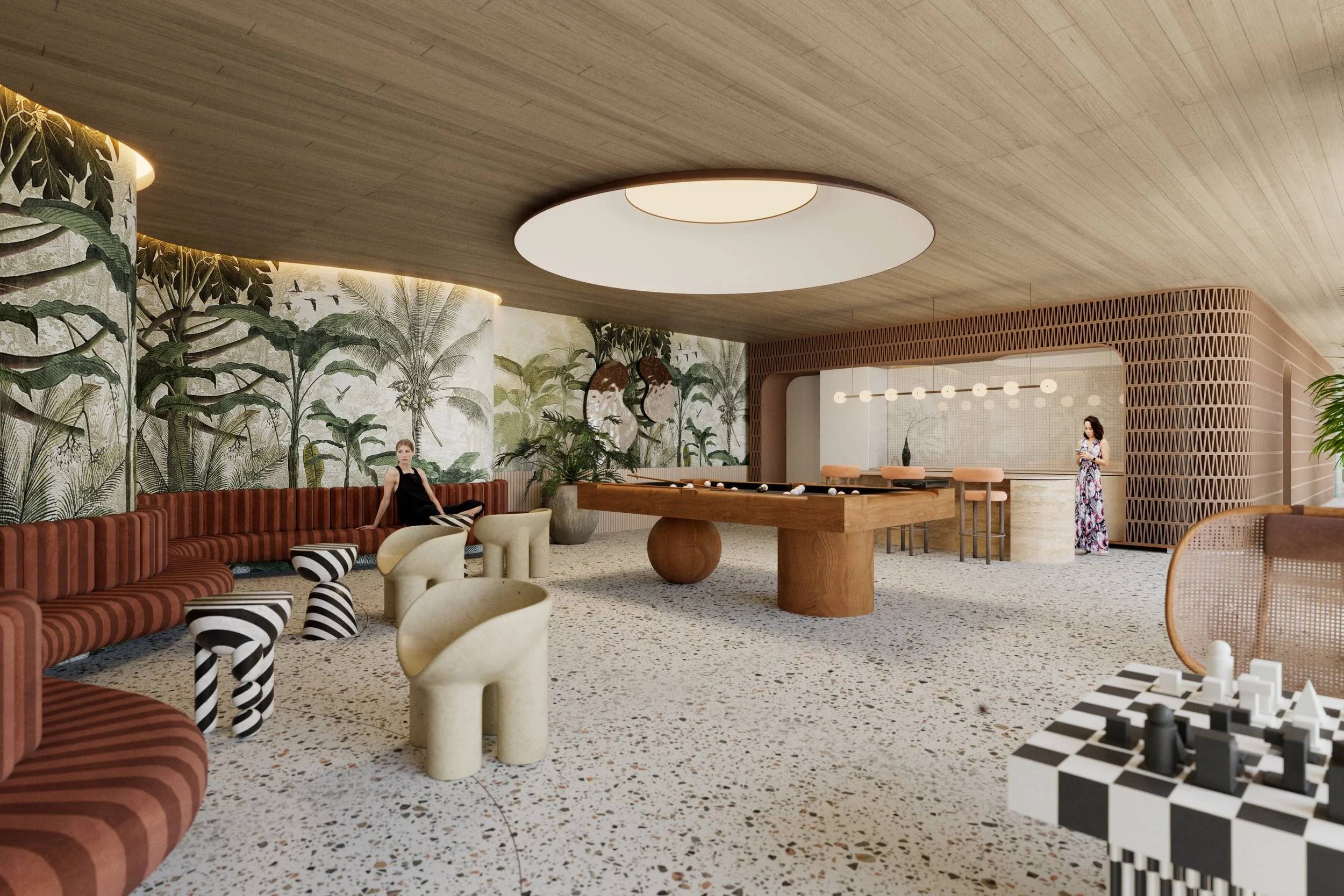 Contemporary lounge with tropical wallpaper, curved ceiling with circular light fixture, red striped sofa, unique beige chairs, a pool table, and a bar area with a woman in a floral dress standing nearby.