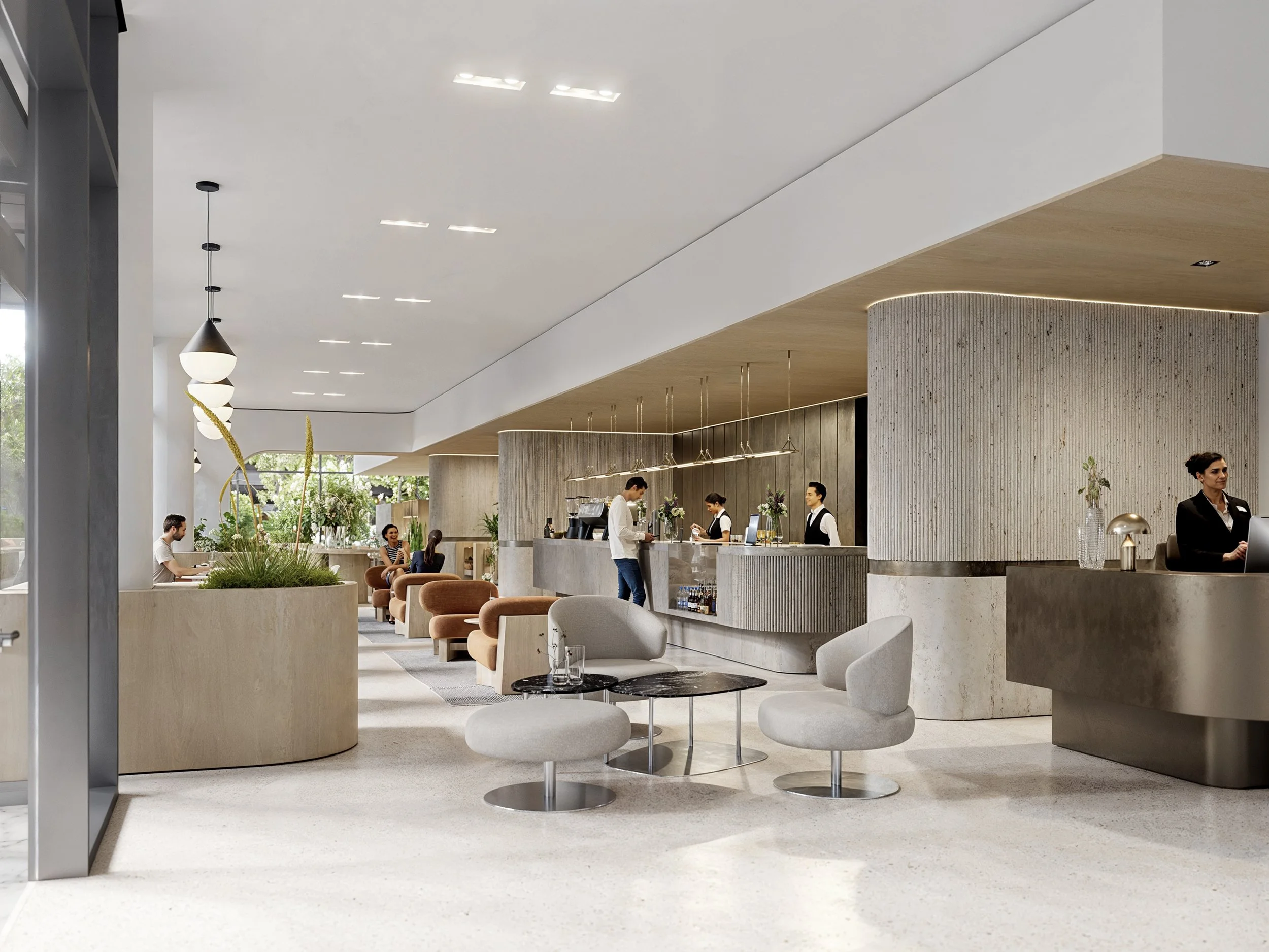 Modern hotel lobby with seating area, contemporary decor, and reception desk with staff assisting guests.