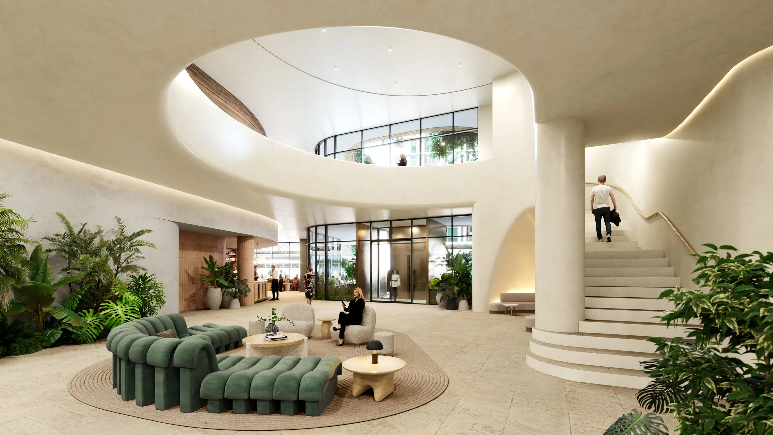Modern hotel lobby with curved white walls, green velvet seating, potted plants, and a staircase leading upward. Large windows and natural light illuminate the space, with people sitting and walking.