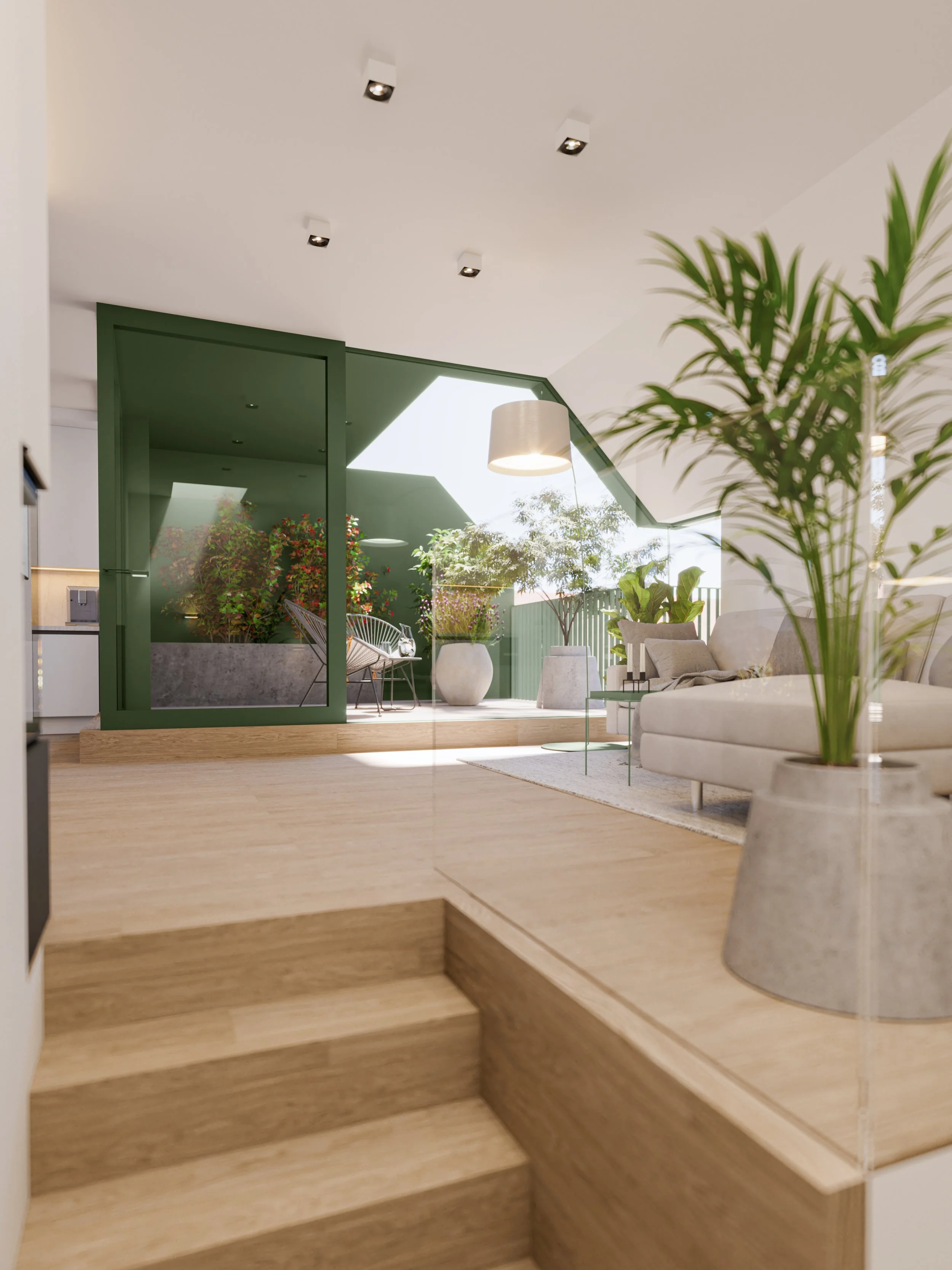 Modern living room with wooden flooring, green partition wall, potted plants, and white furniture. Large window with sunlight and outdoor plants visible.