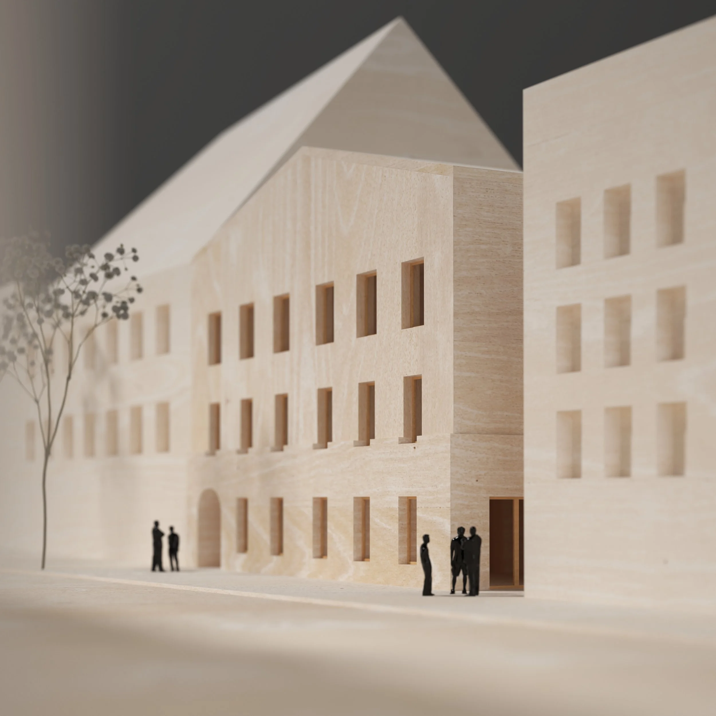 A wooden architectural model of a multi-story building with a gabled roof, multiple windows, and a small doorway, with miniature human figures and a tree for scale.