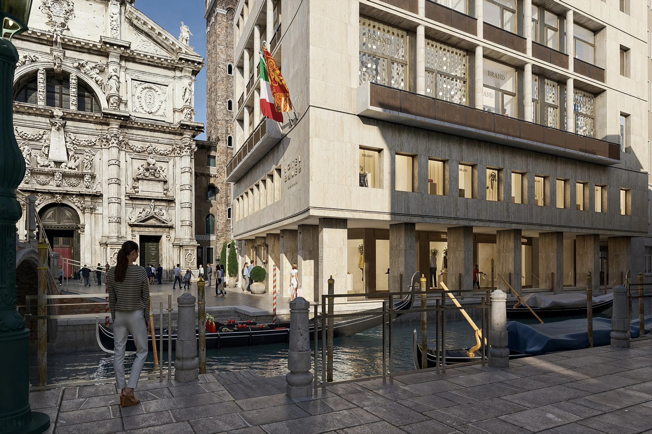 A woman standing on a canal-side promenade looking at a modern building with large windows and a flag, with an ornate historic building in the background, and gondolas docked in the water.