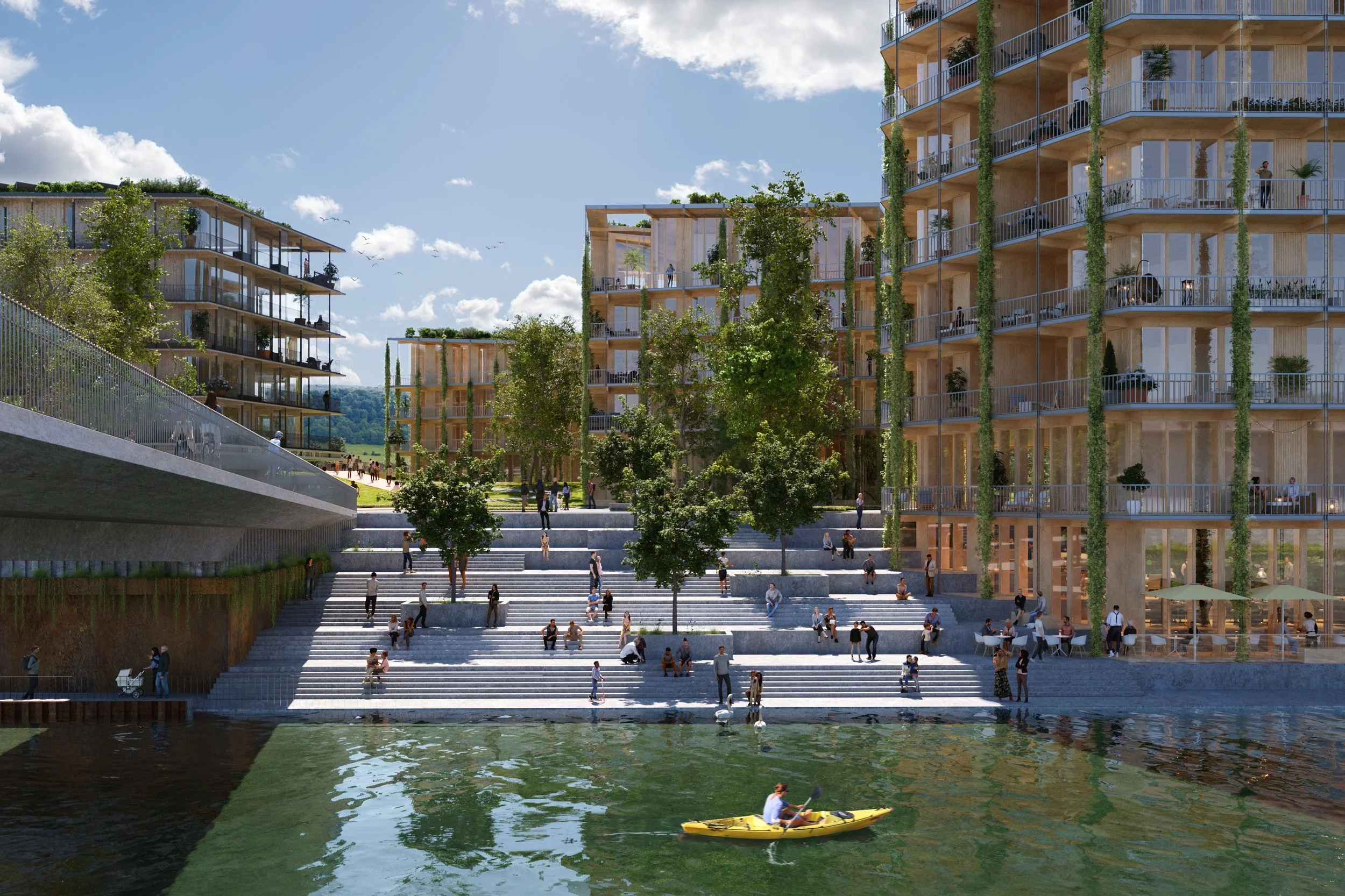 Rendering of a modern waterfront residential development with multi-story buildings, outdoor terraces, lush greenery, and a stepped staircase leading to a water's edge, where a person is kayaking.