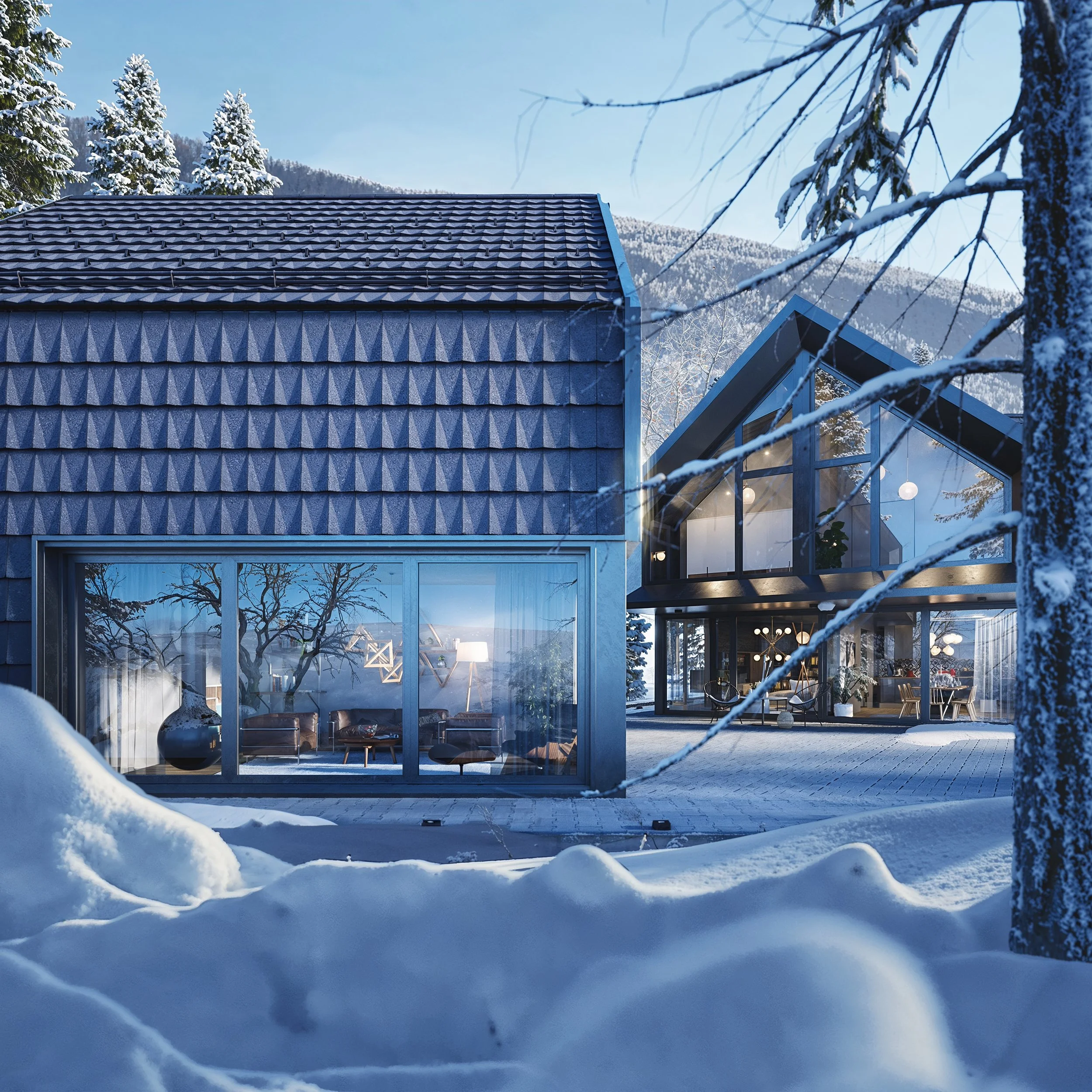 Modern house with large glass windows and blue exterior, surrounded by snow and trees, with a mountain in the background.