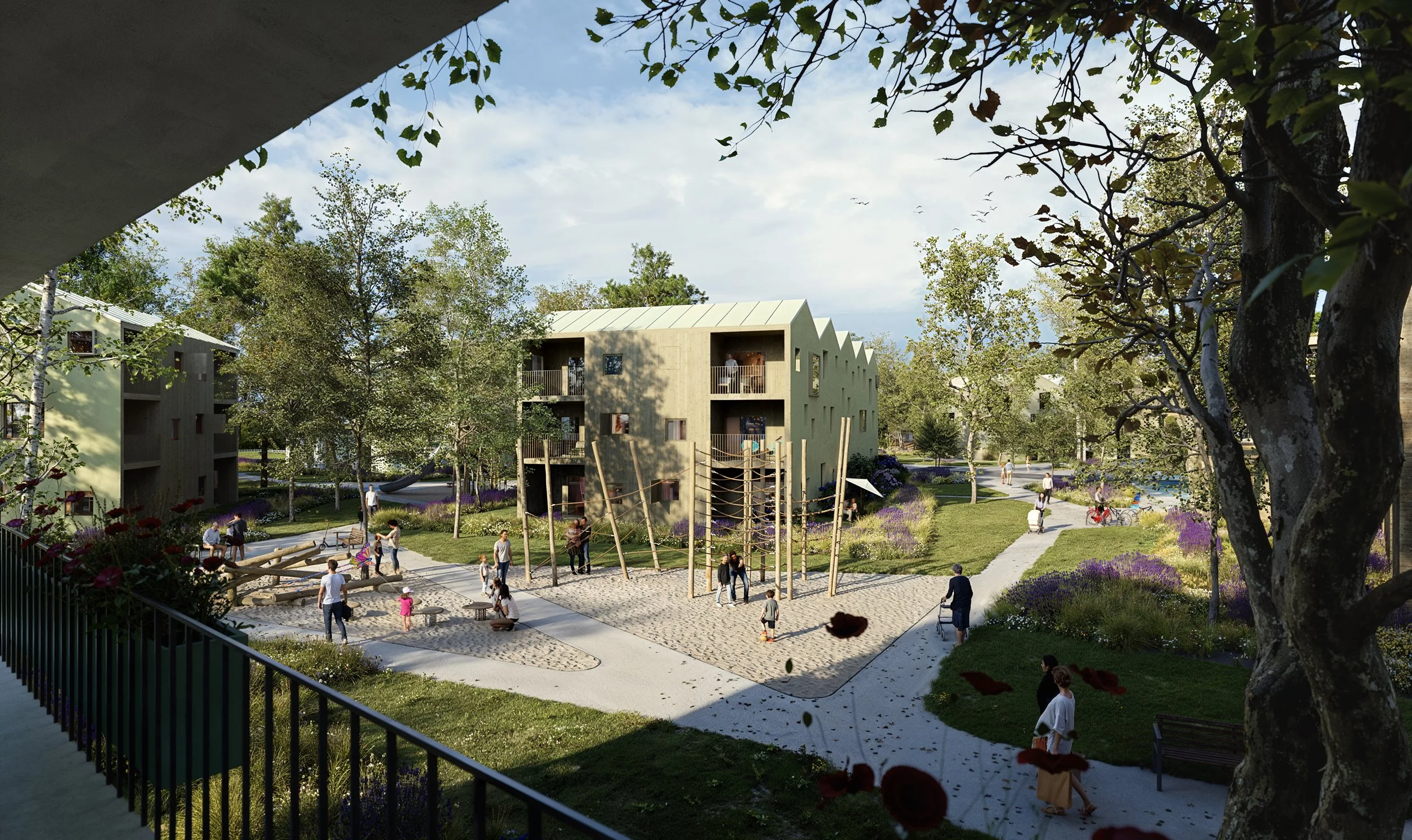 Children and adults playing and walking in a community park with modern apartment buildings, trees, and purple flowers.