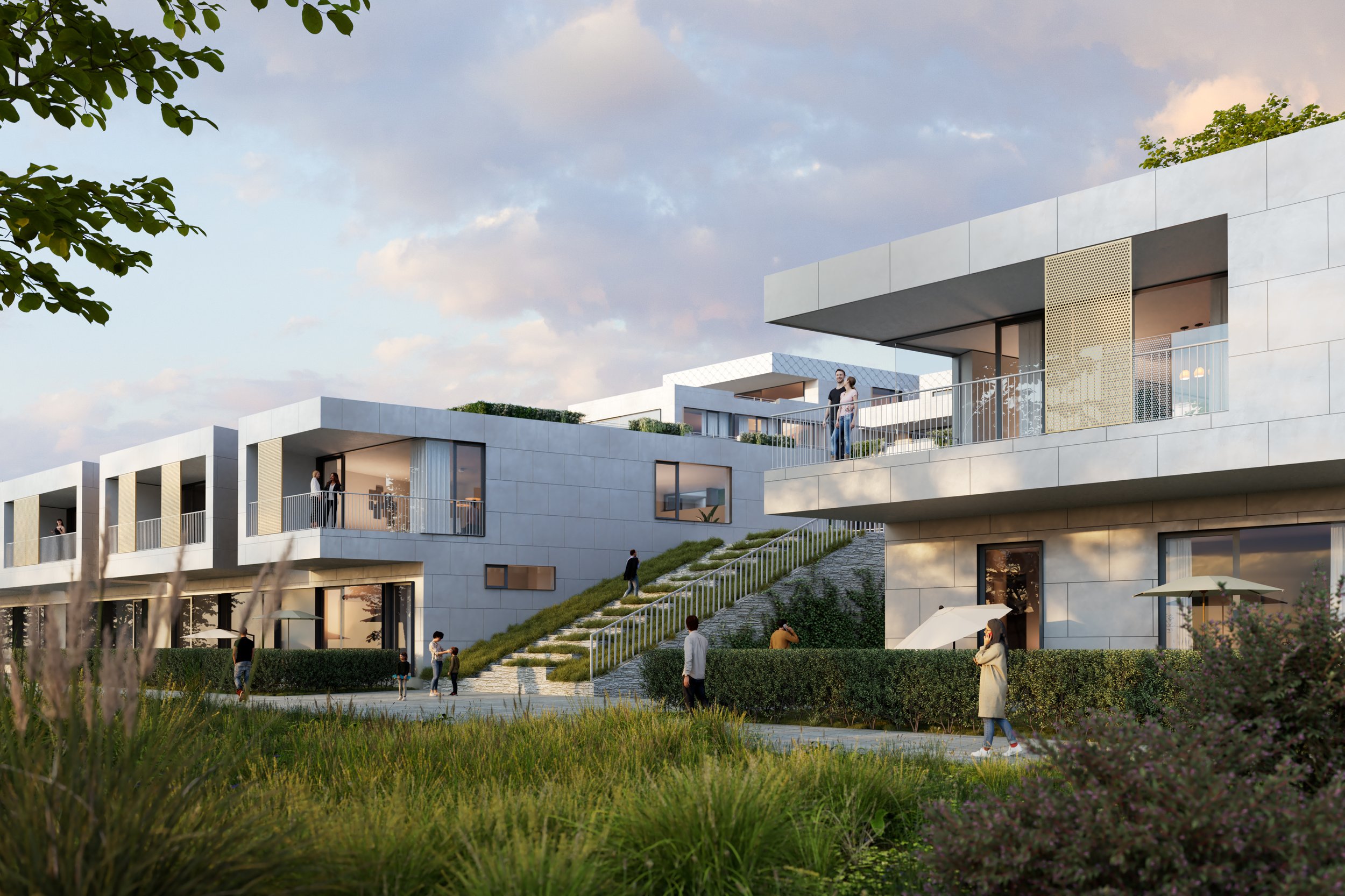 Modern residential building with multiple floors and balconies, surrounded by landscaped greenery, with people walking and standing outside.