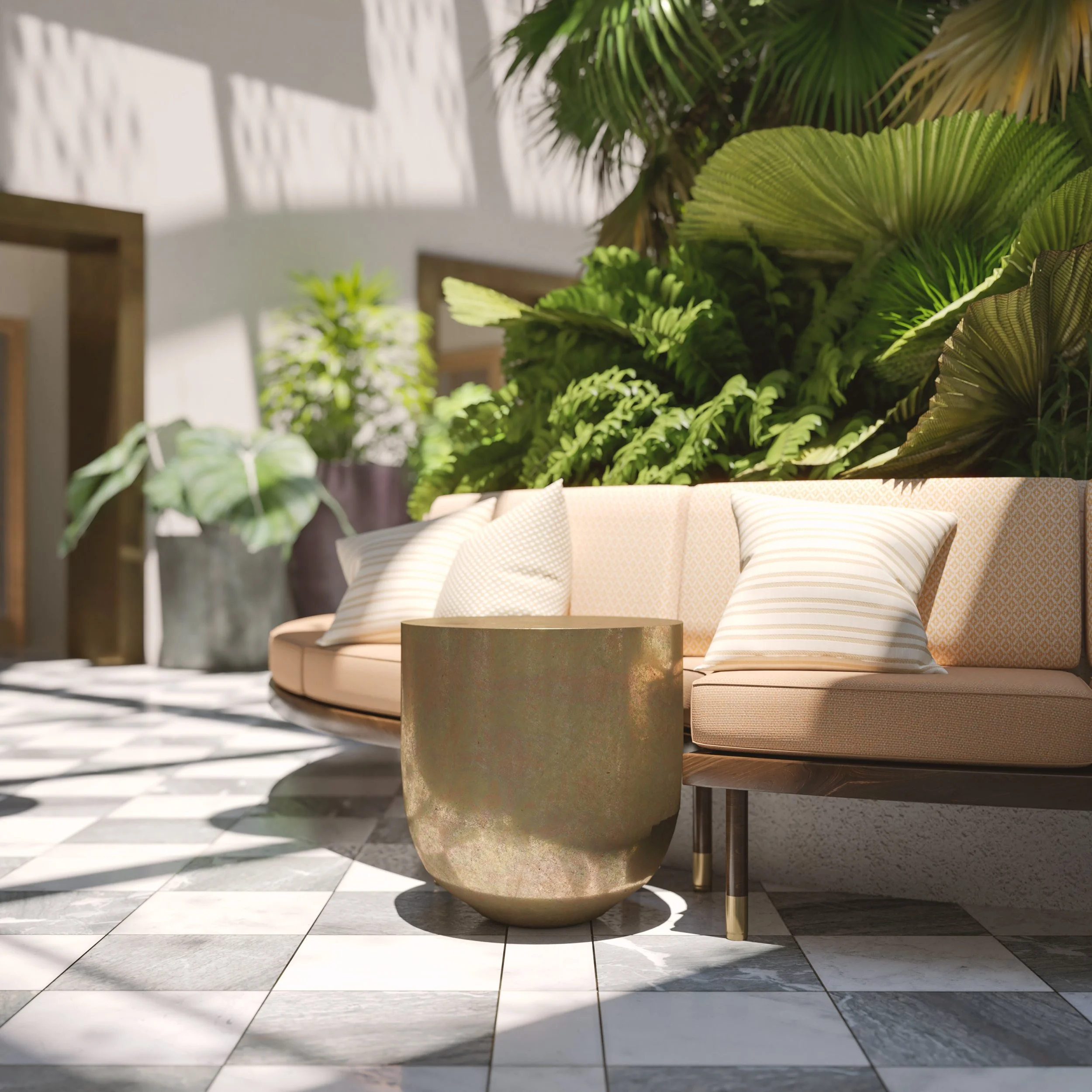 Outdoor patio with a beige curved sofa, striped cushions, a round metallic gold table, large green plants, and a checkered tile floor, sunlight casting shadows.