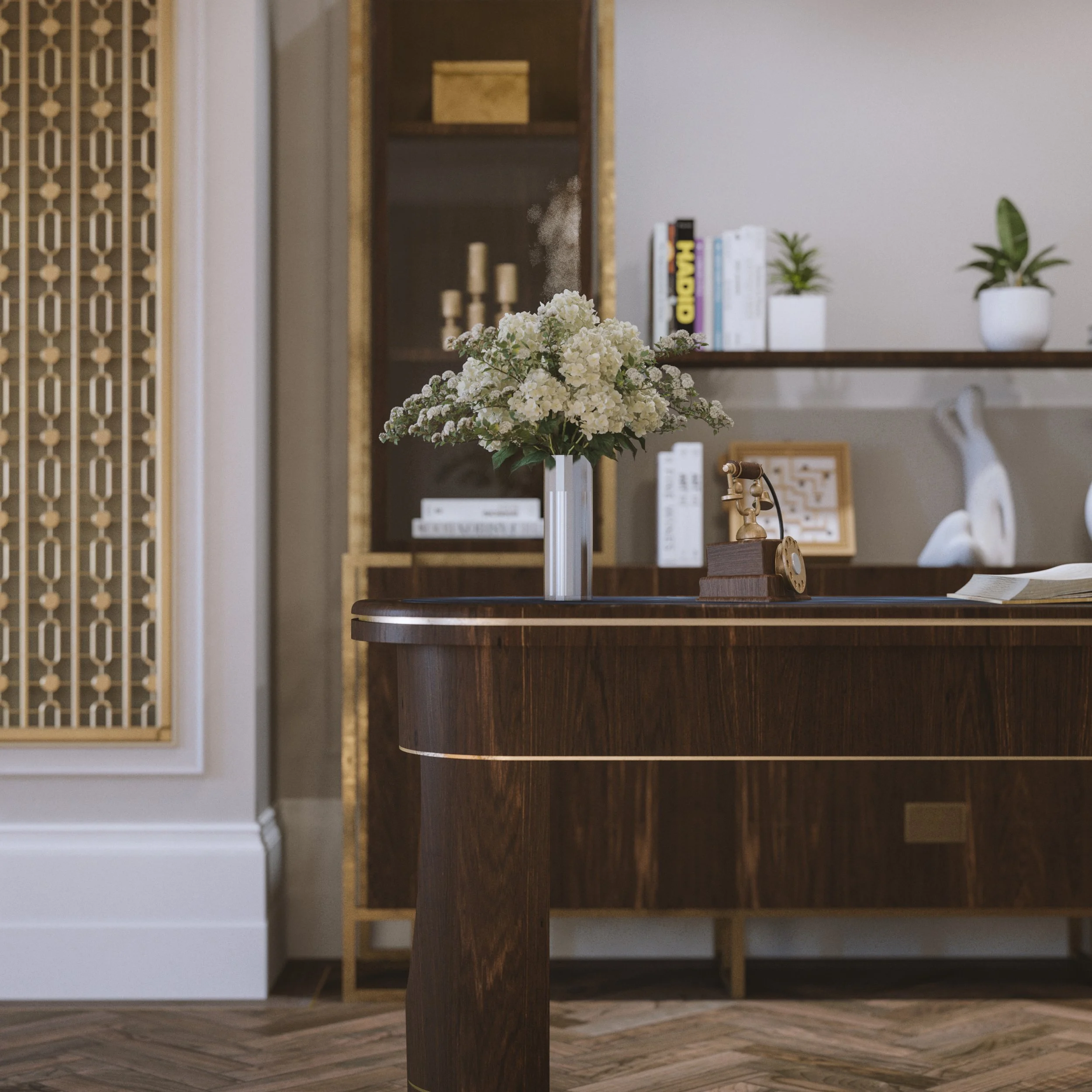 A dark wooden desk with a brass vintage telephone and a white vase with white flowers, in a modern home or office setting.