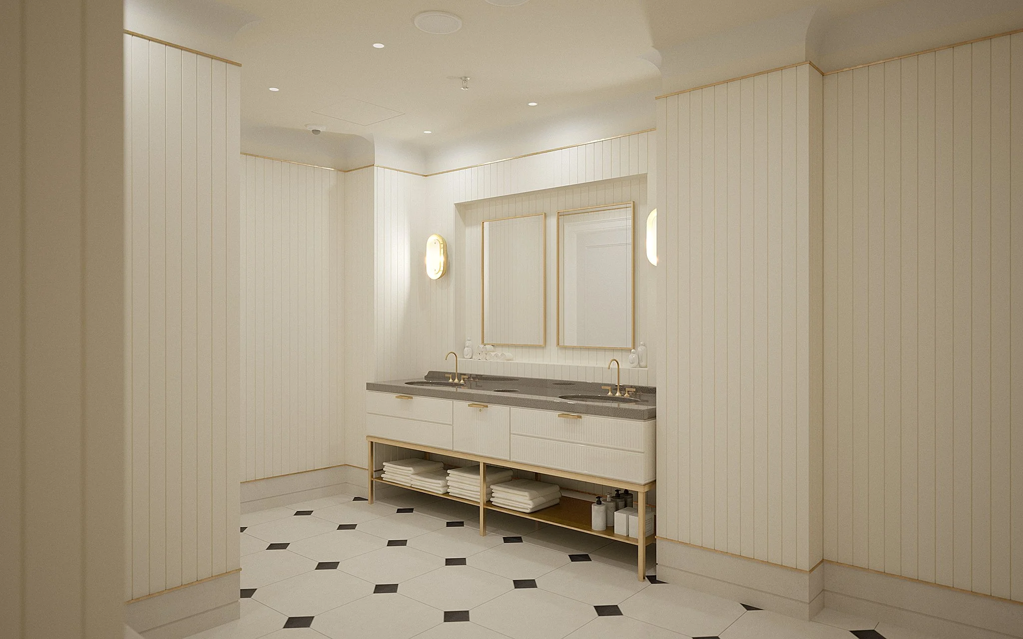 A modern bathroom with two sinks, a large mirror, gold fixtures, and naturally lit with small wall sconces. White cabinetry with open shelves below holds towels and toiletries. The floor has white tiles with black diamond-shaped accents.