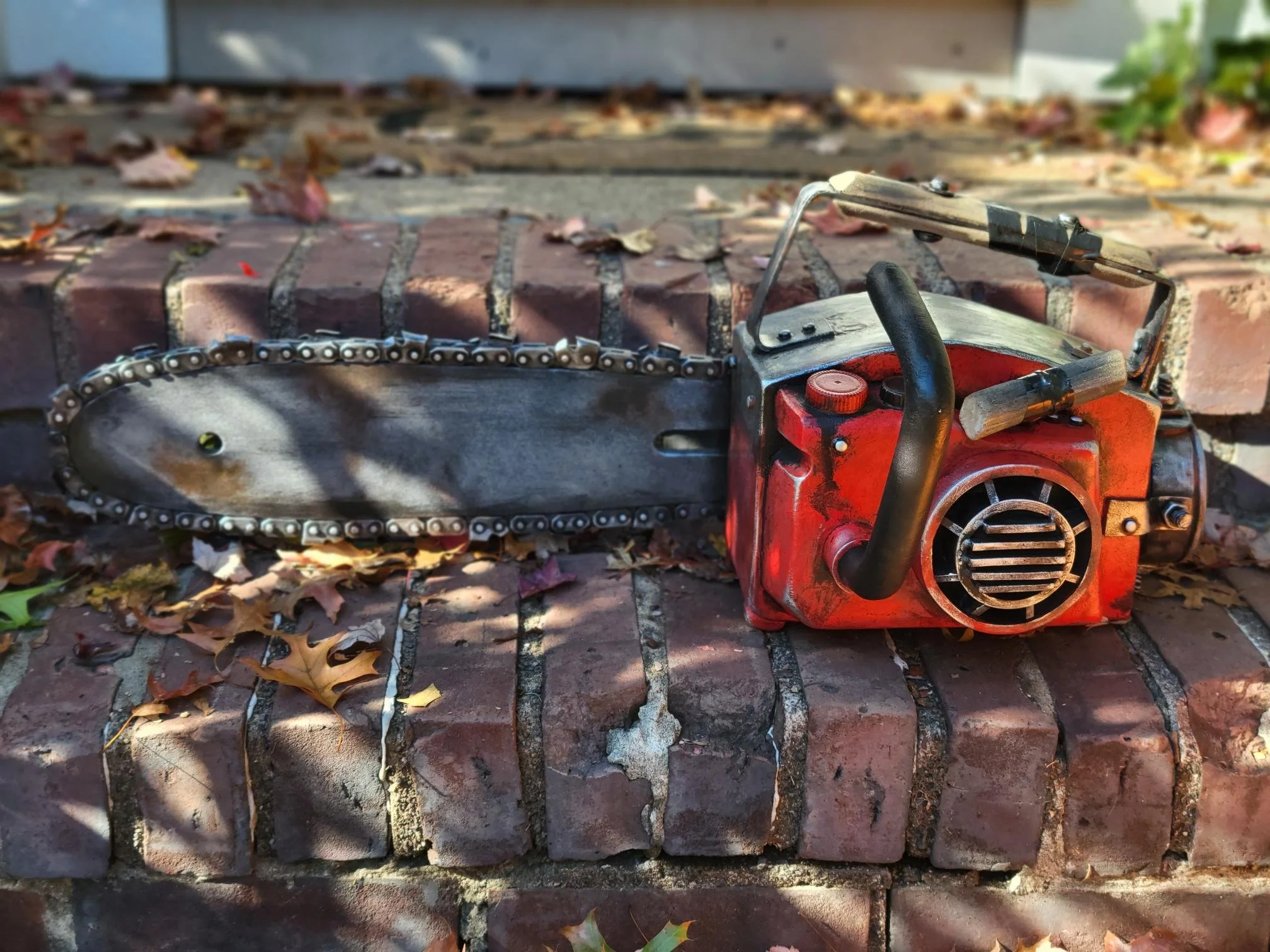 Chainsaw from Evil Dead 2 - 
EVA foam, plastidip, acrylic paint