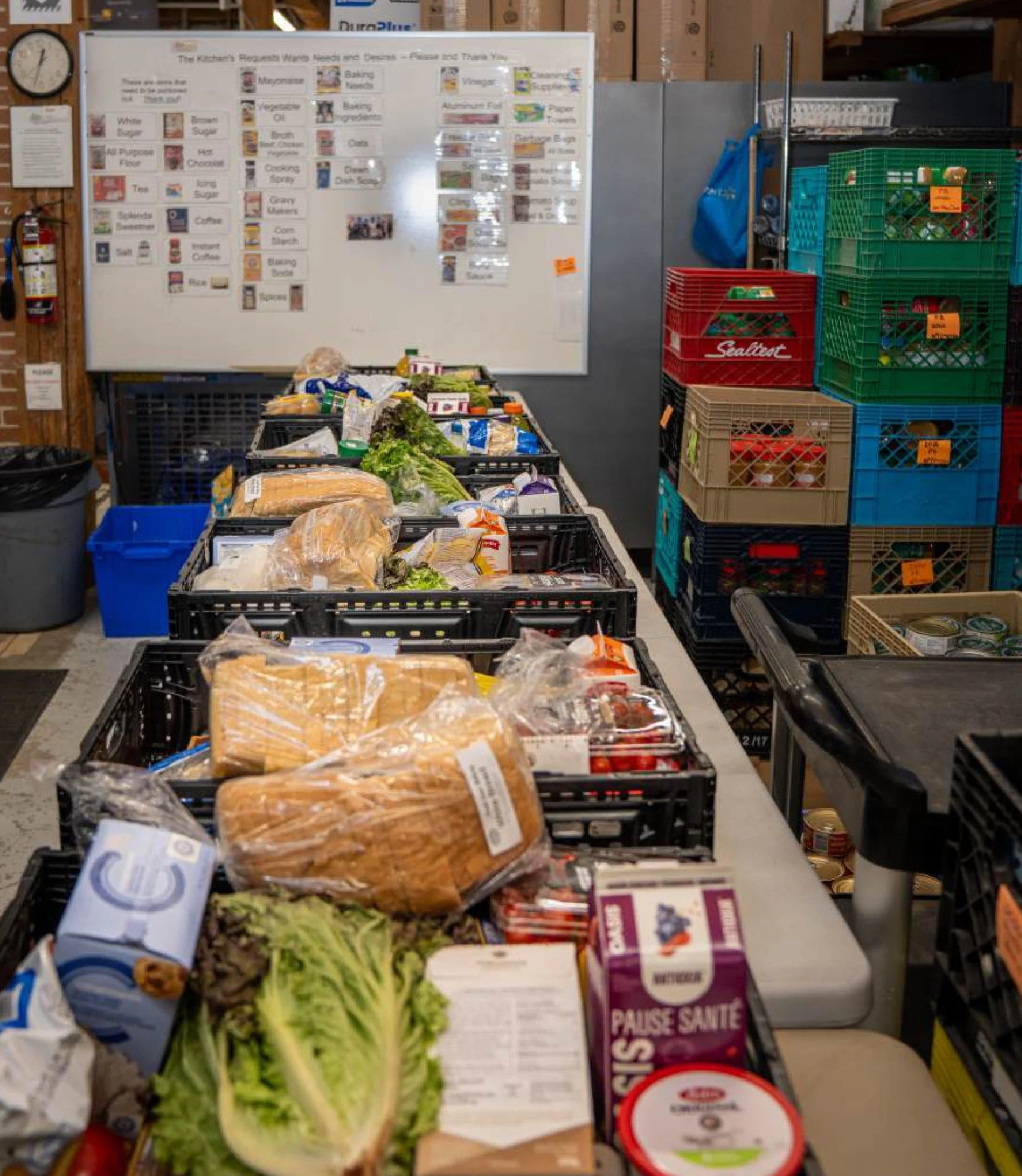 baskets of food prepared on a long table