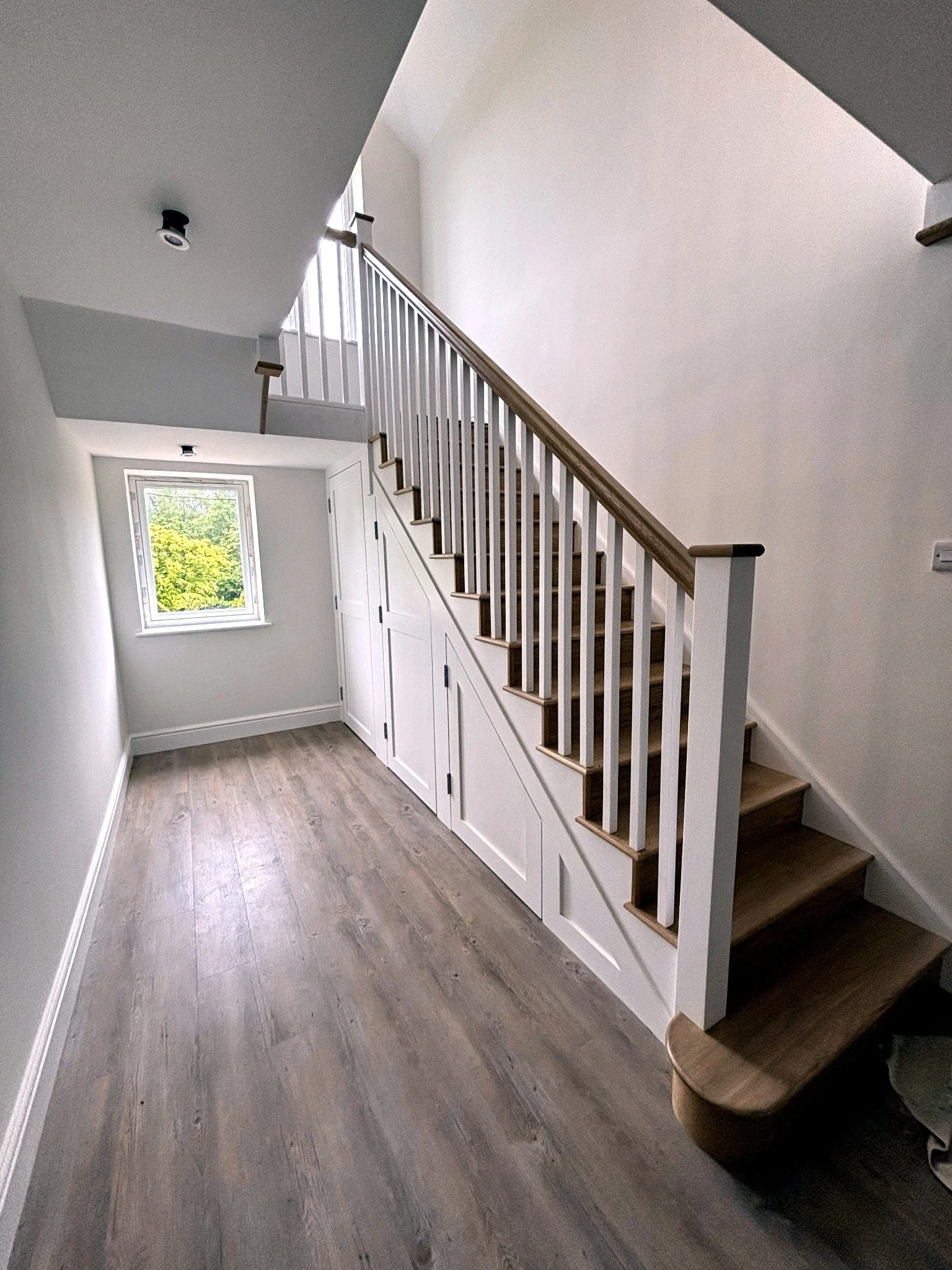 Bespoke staircase and fitted joinery completed as part of an extension project