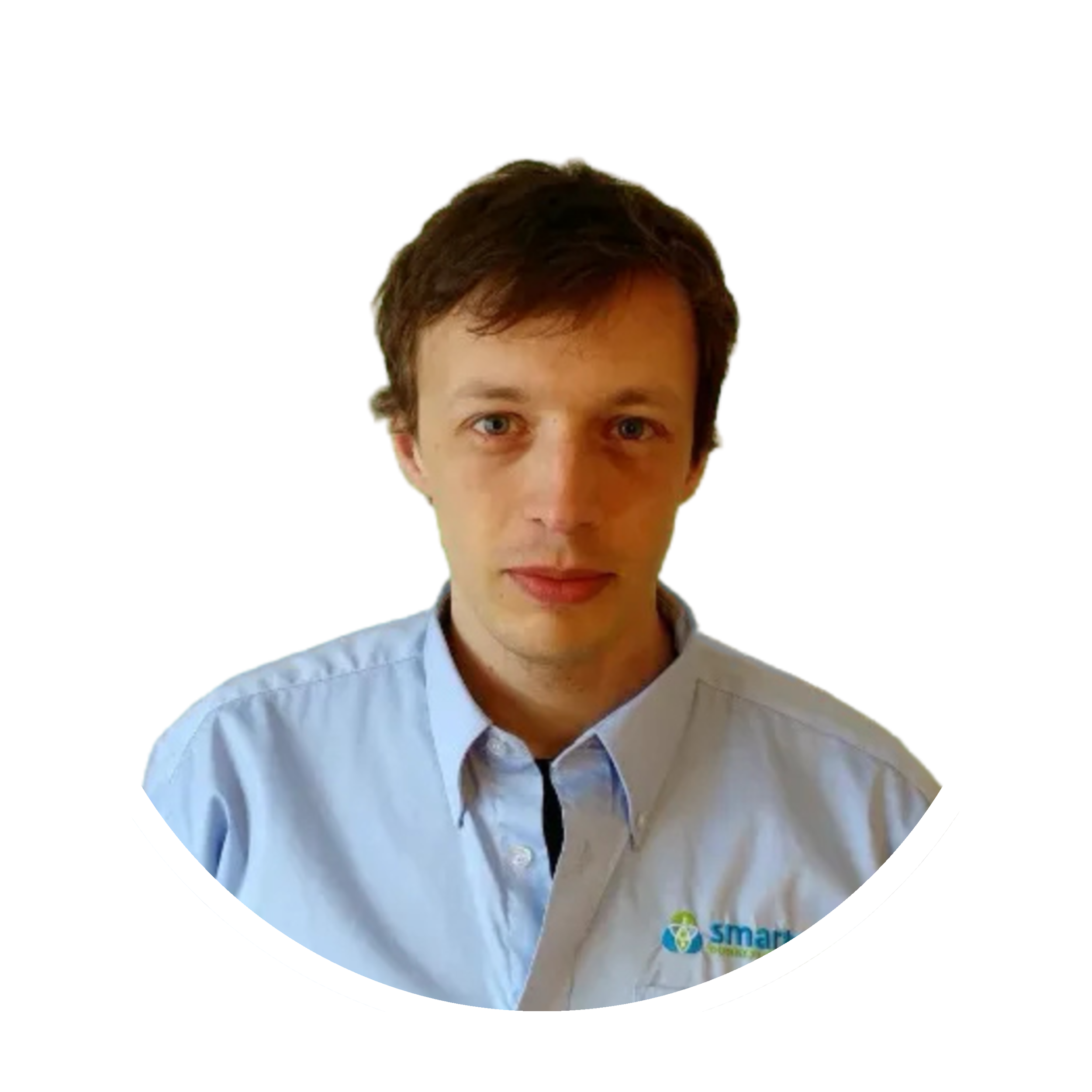 A young man with brown hair wearing a light blue collared shirt with a logo on the left side that reads 'smart'.